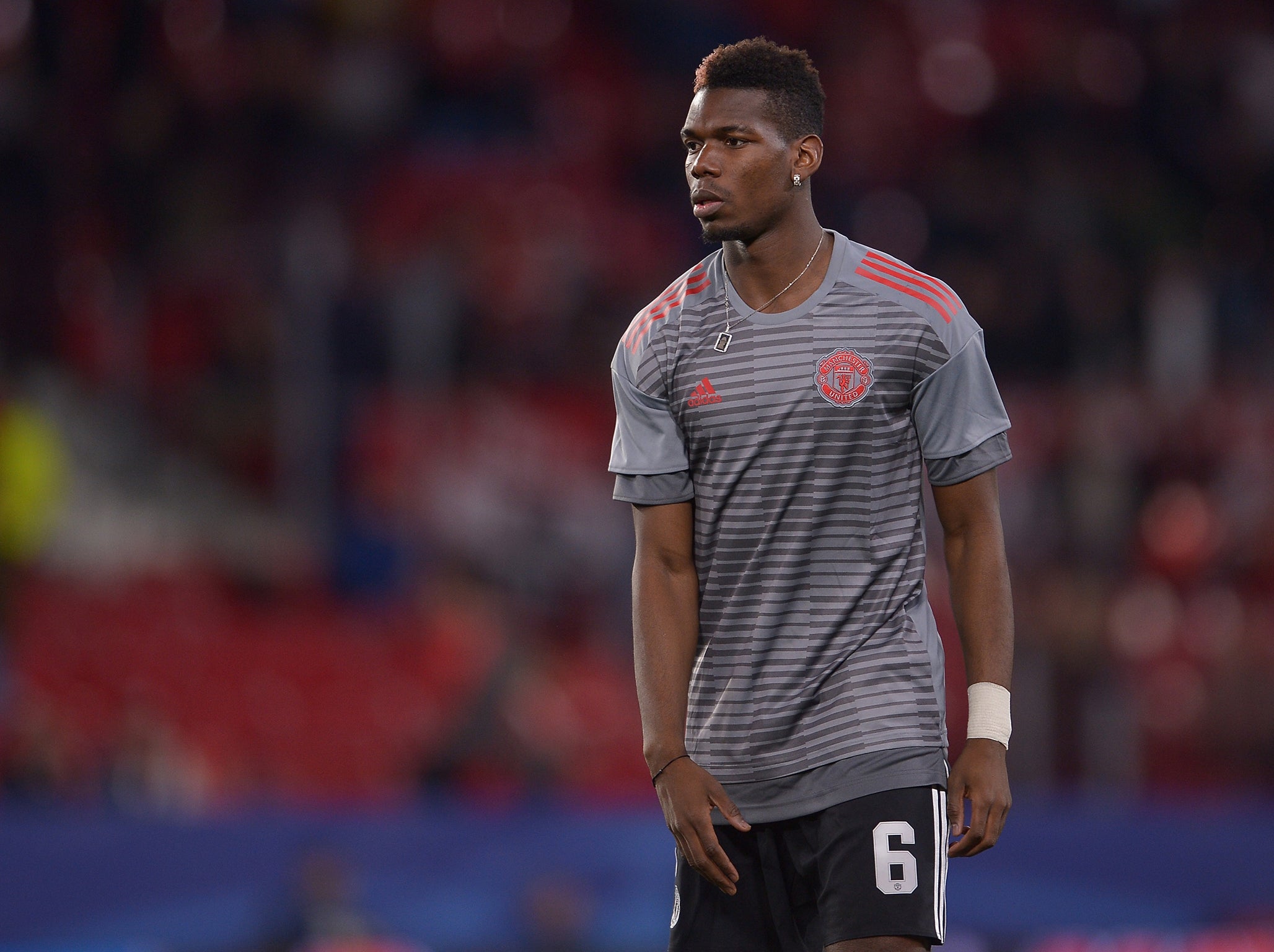 Paul Pogba started the Sevilla game on the subs bench