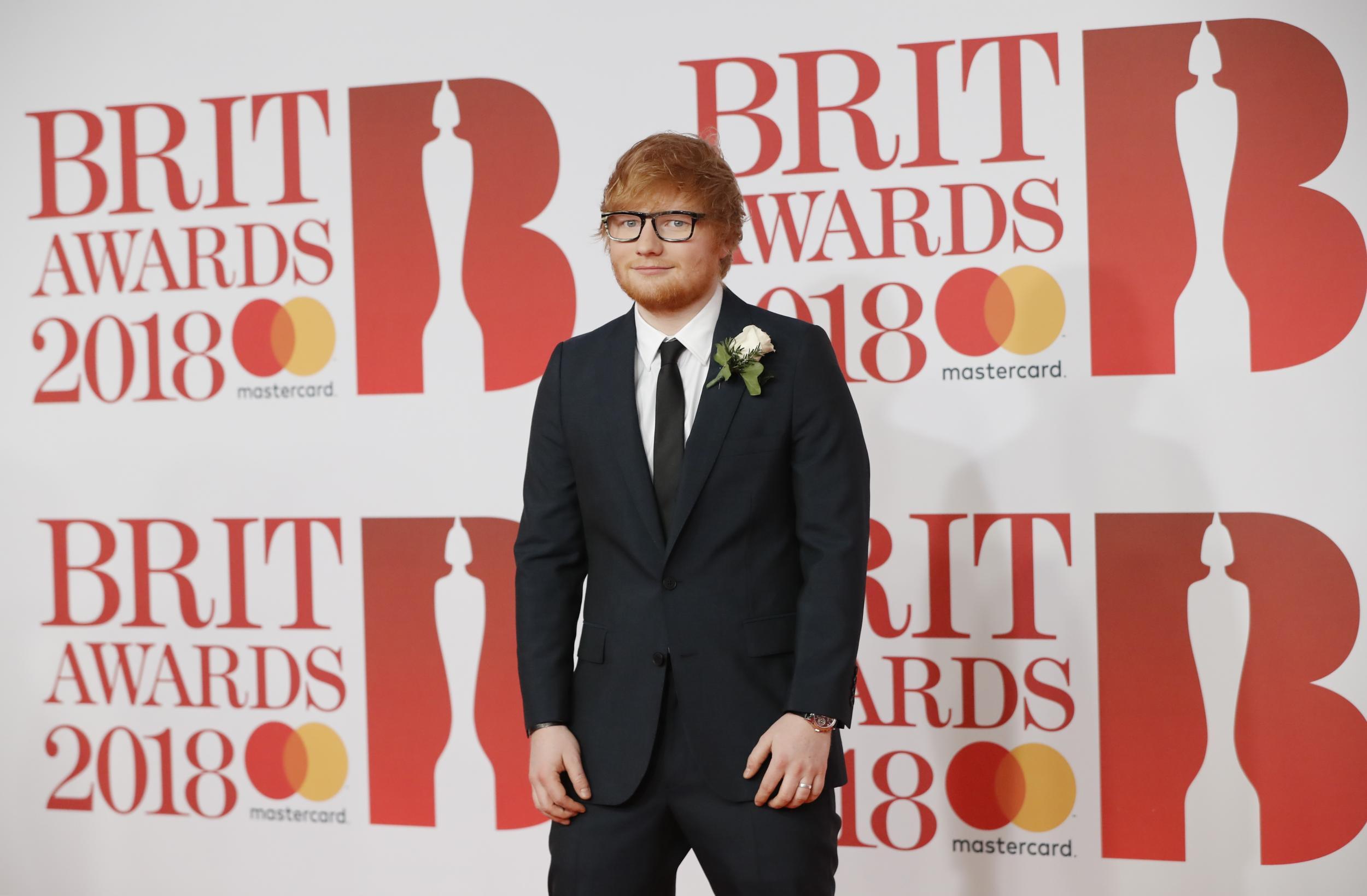 Ed Sheeran wears an engagement ring on the red carpet at the Brit Awards (Getty)