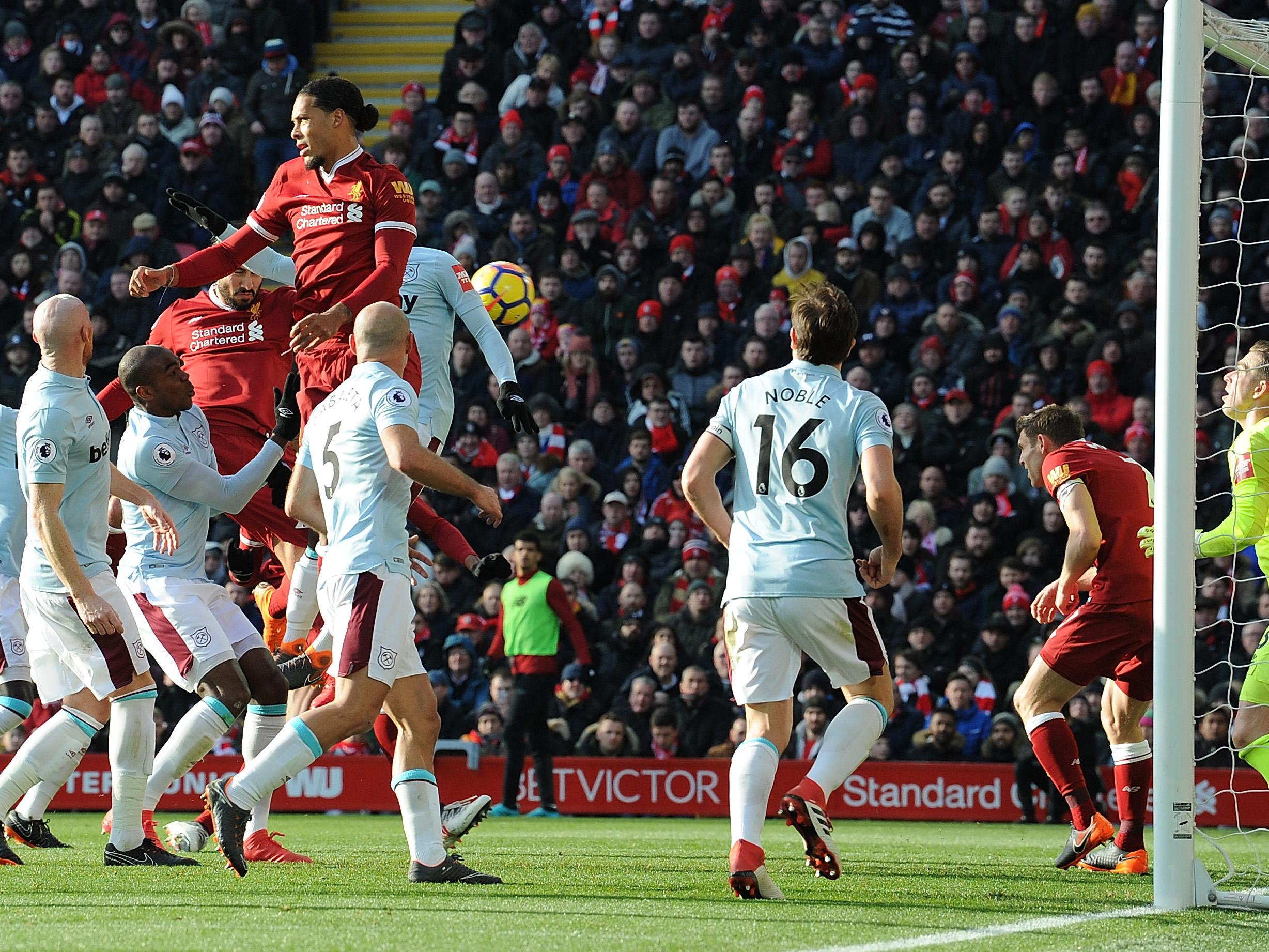 Emre Can nods home the opener for Liverpool