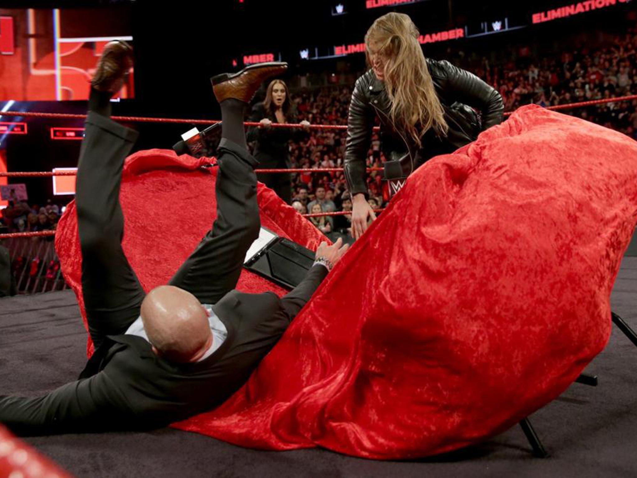 Rousey launched Triple H through a table