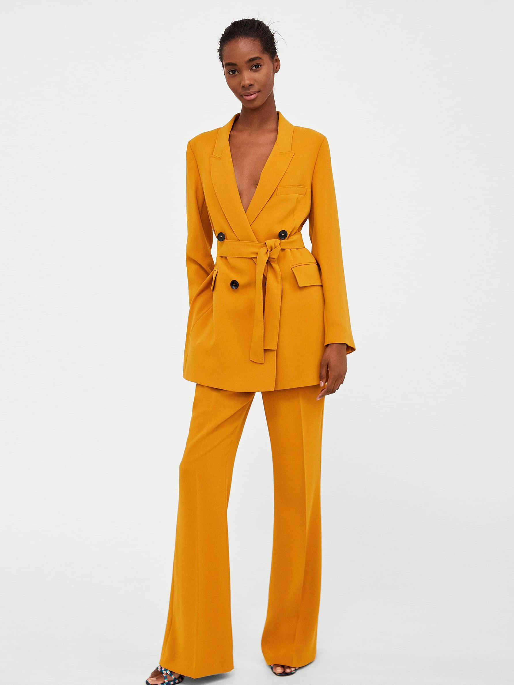 Long belted jacket £79.99, Flared Trousers £39.99, zara.com