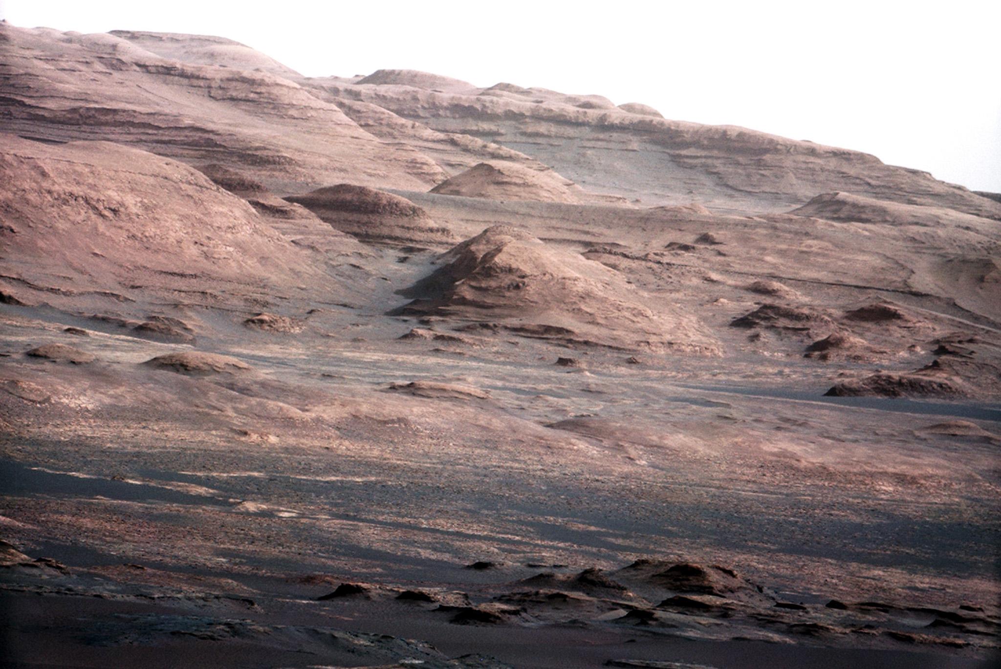 The base of Mars' Mount Sharp - the rover's eventual science destination - is pictured in this August 27, 2012 NASA handout photo taken by the Curiosity rover