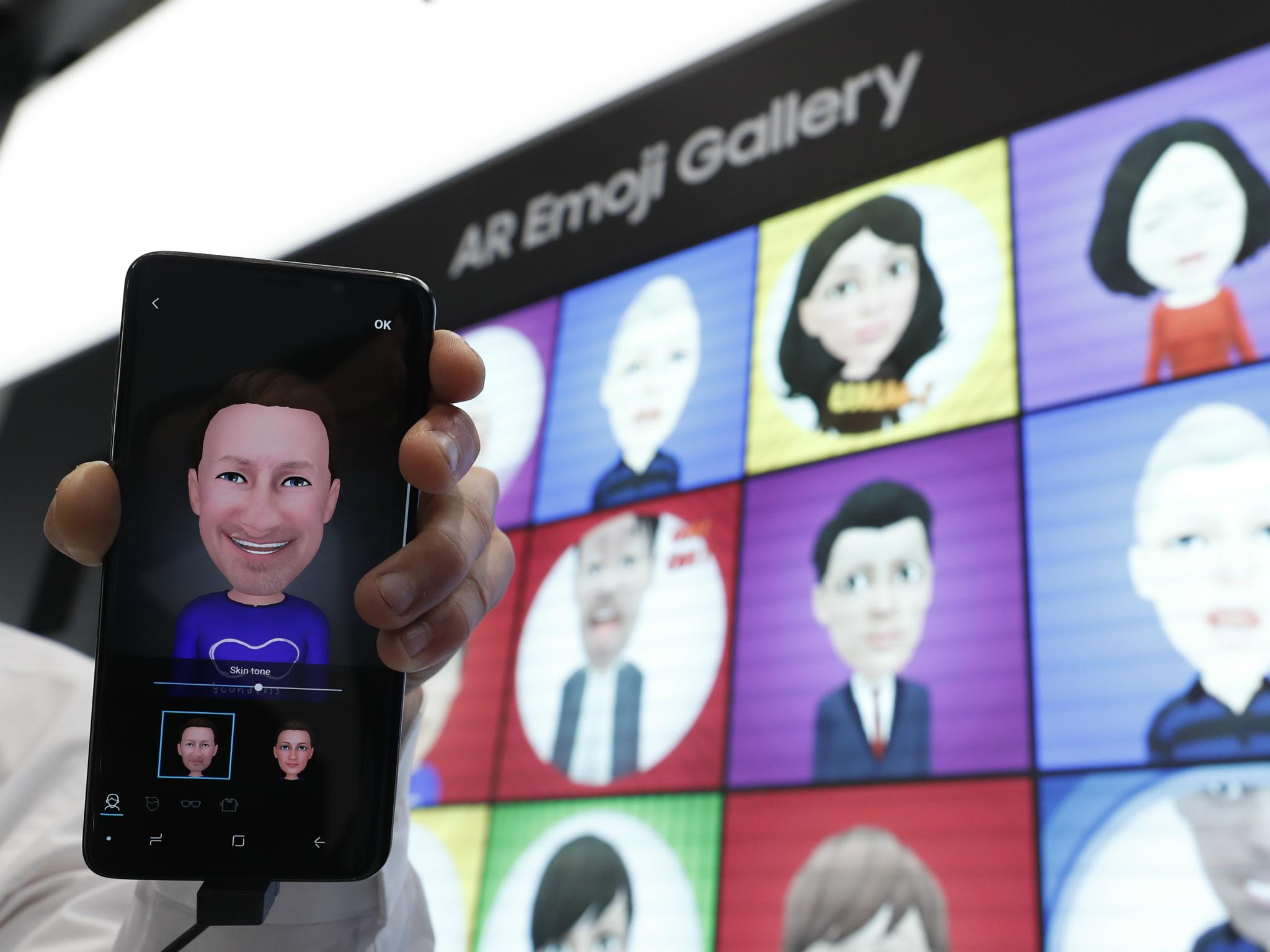 A Samsung Galaxy S9 is displayed with an AR emoji at the Samsung booth at the Mobile World Congress in Barcelona, Spain, February 26, 2018