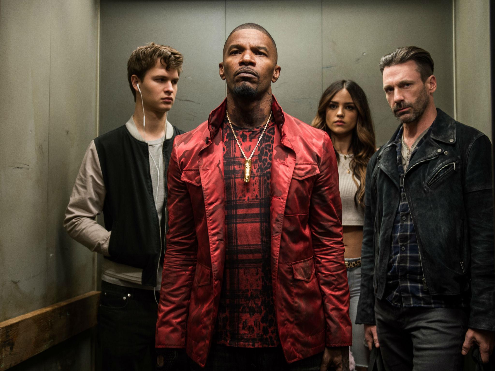 Ansel Elgort, Jamie Foxx, Eiza González, and Jon Hamm in a scene from Edgar Wright’s film ‘Baby Driver’