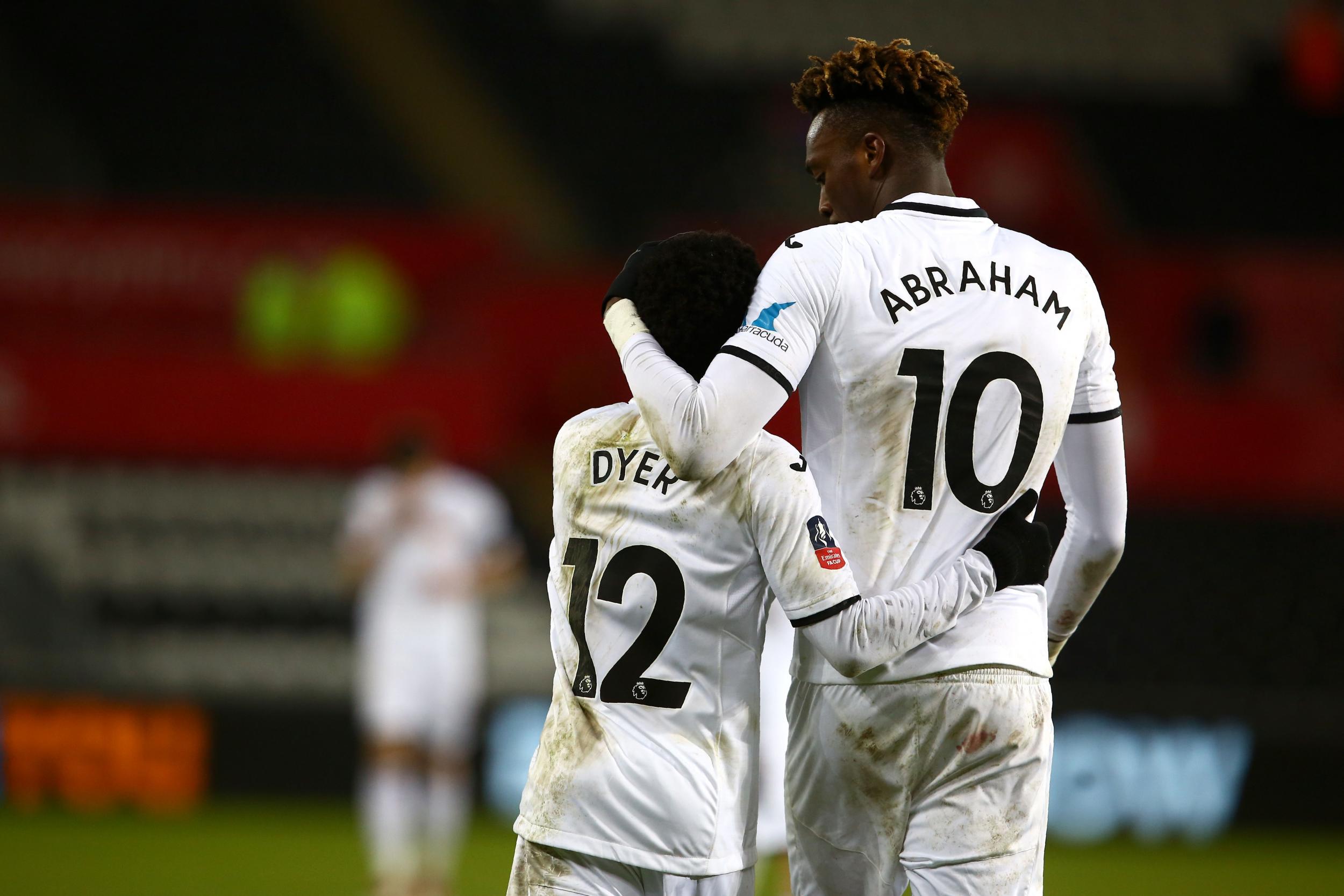 Nathan Dyer celebrates with Swansea team-mate Tammy Abraham