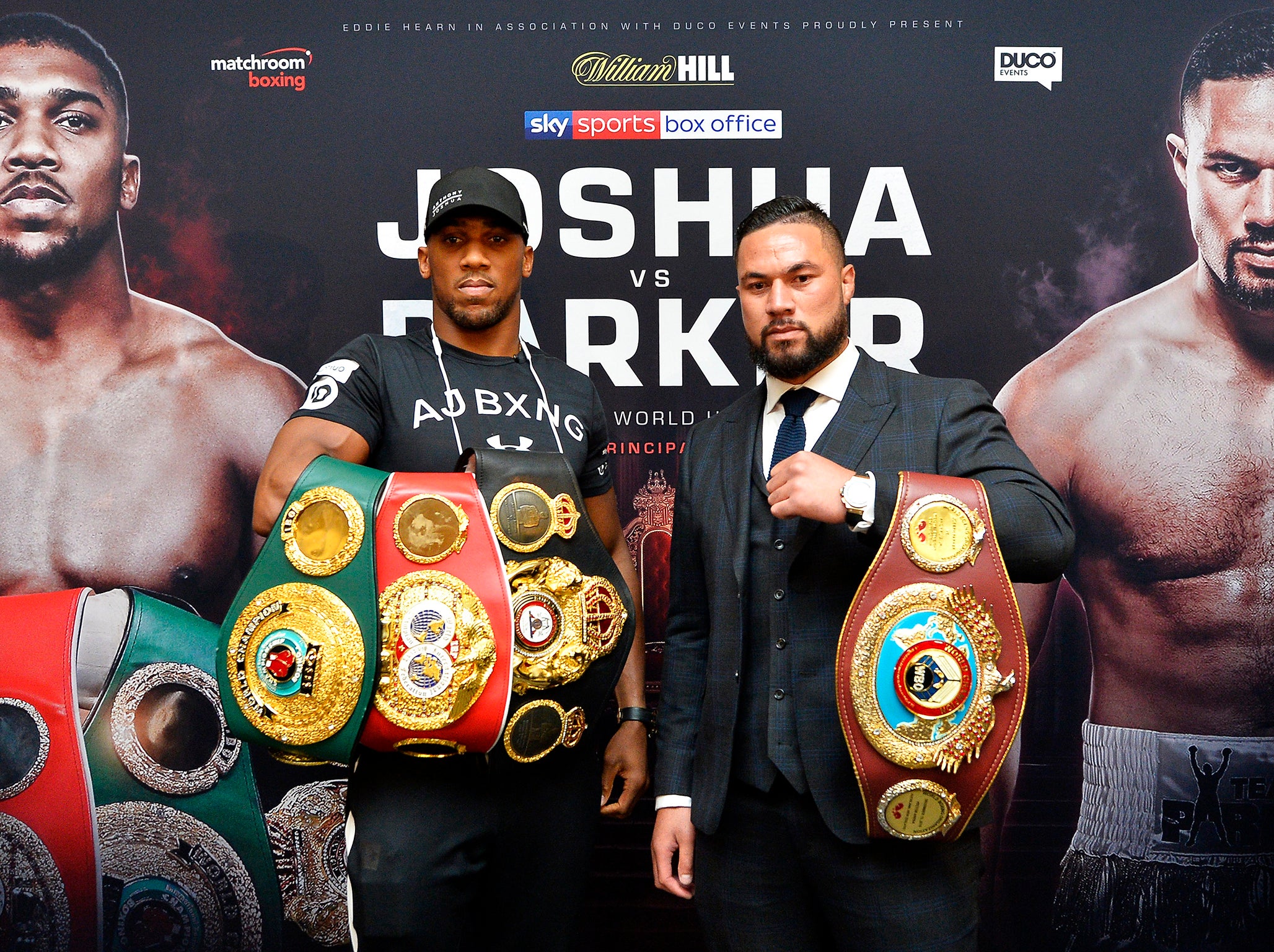 Joshua and Parker display their belts