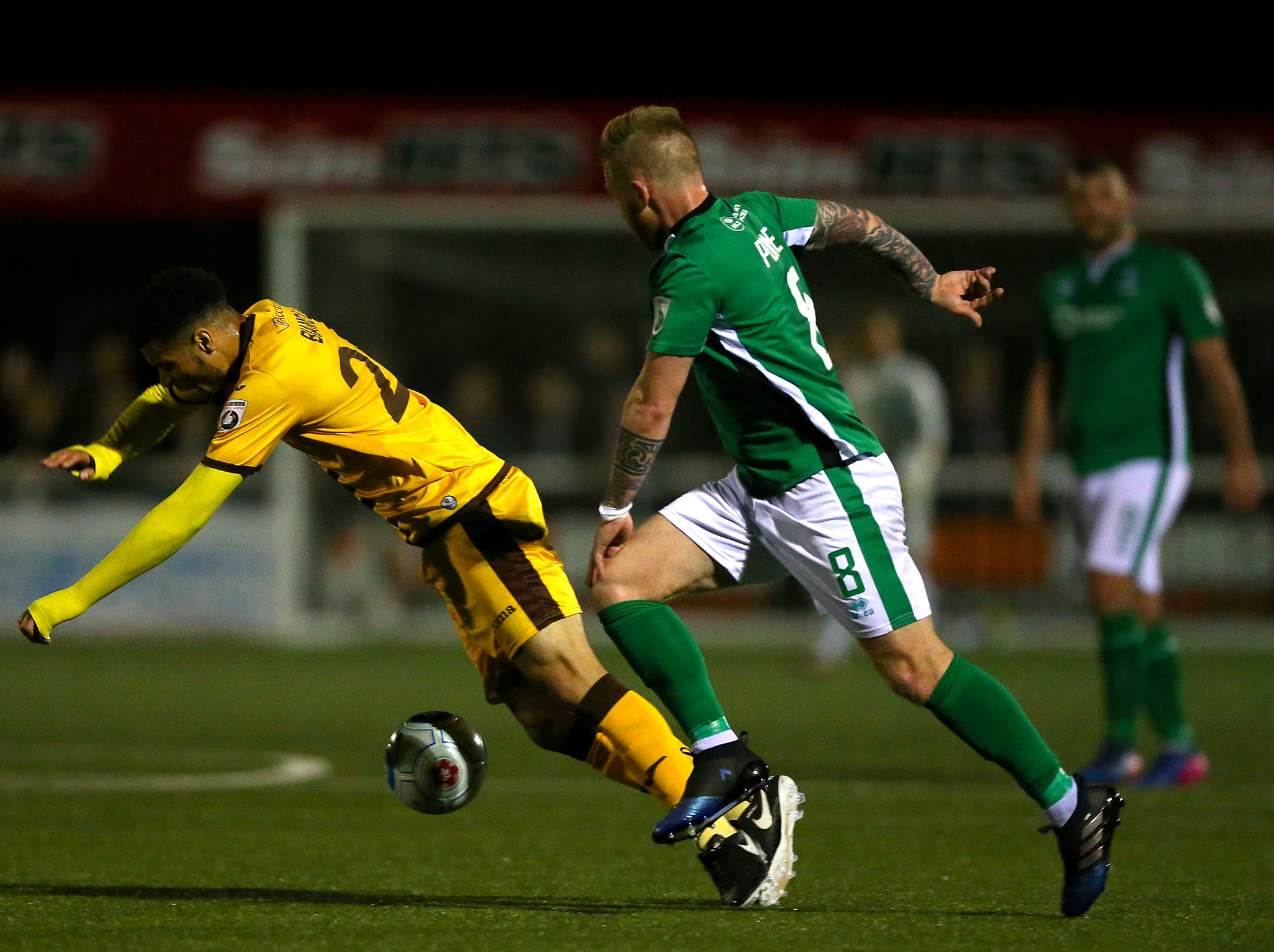 Sutton United play on an artificial surface at Gander Green Lane