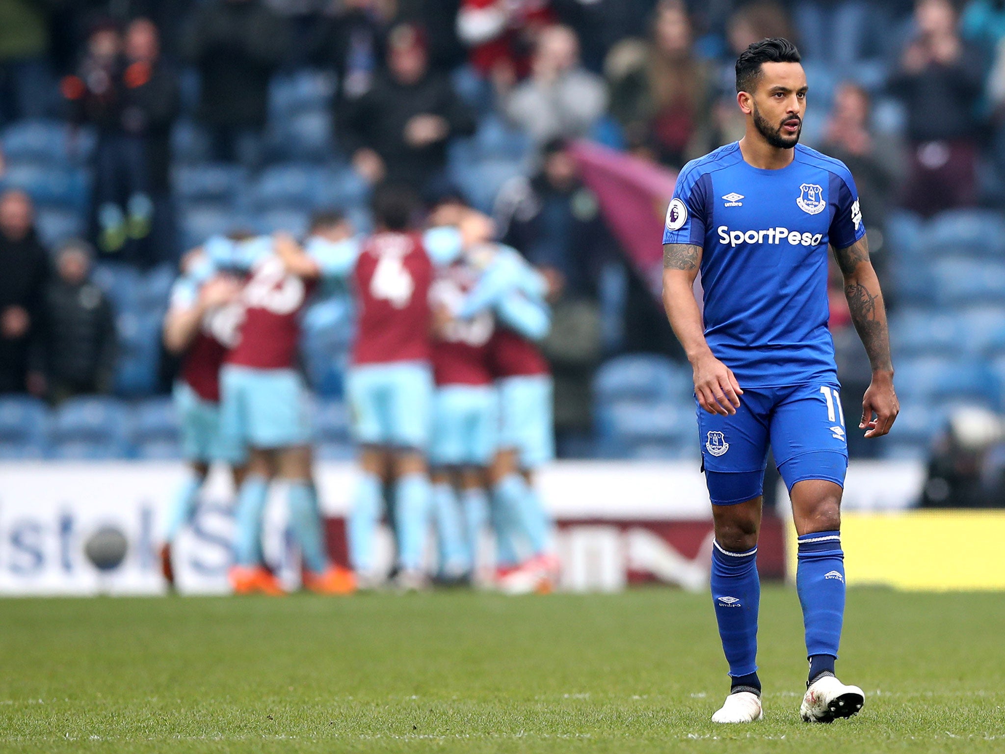 Theo Walcott looks on after Burnley's equaliser