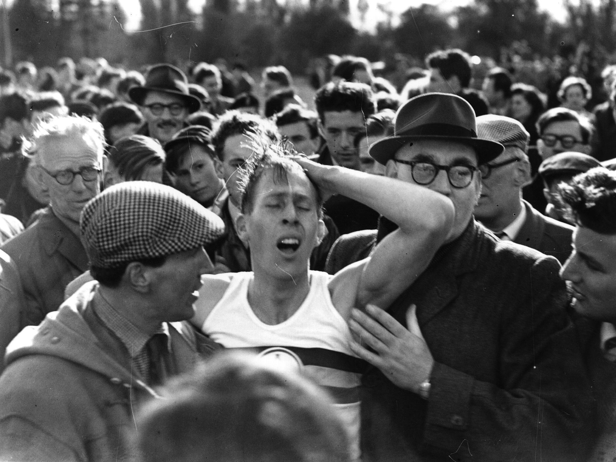 Bannister just after his record-breaking run at the University of Oxford’s Iffley Road track in Oxford