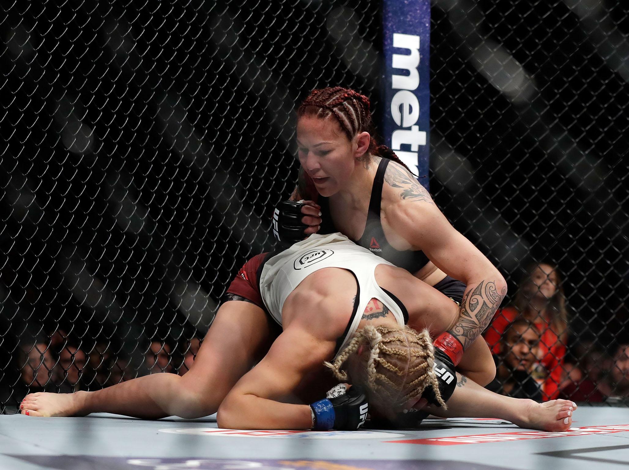 Cris Cyborg gets on top of Yana Kunitskaya in their Vegas battle