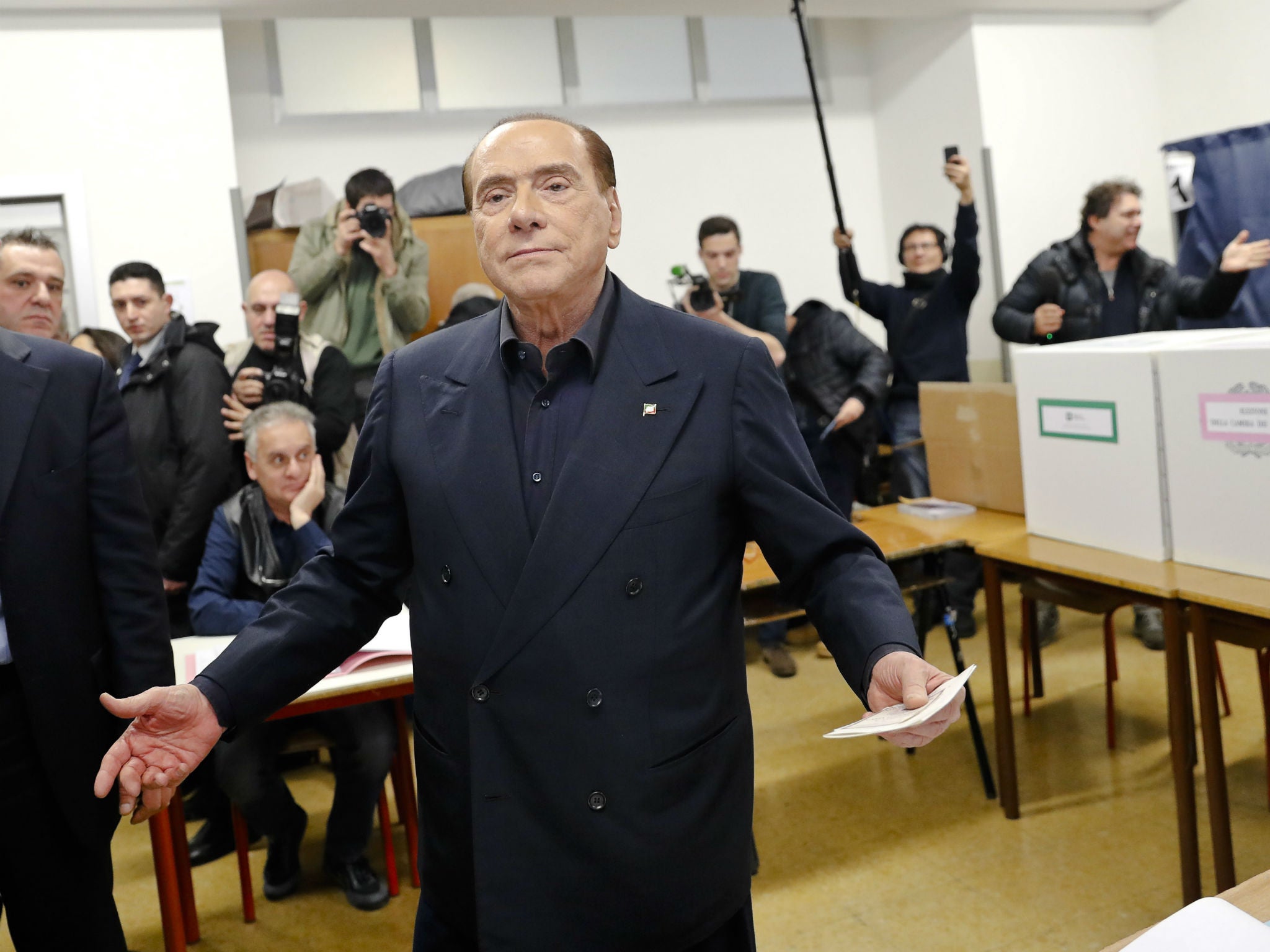 Italian former prime minister and leader of Forza Italia, Silvio Berlusconi, at a polling station in Milan (Antonio Calanni/AP)