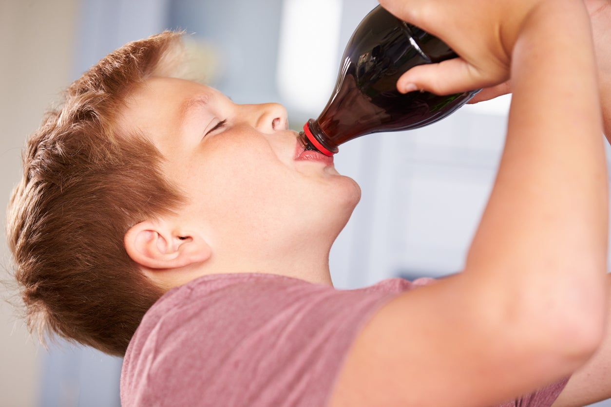 Children should be discouraged from consuming fizzy drinks with a high-sugar content, campaigners argue