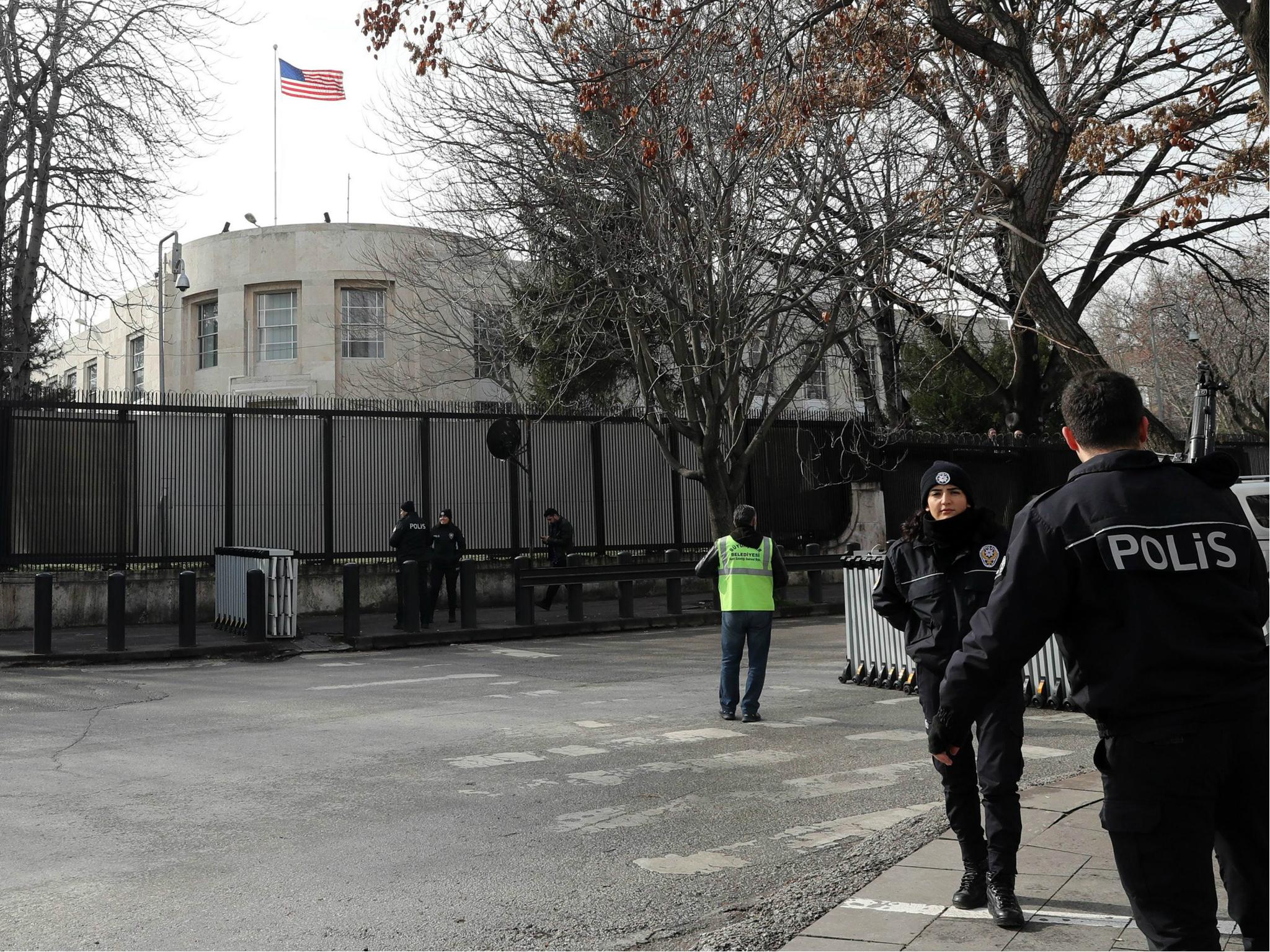 Policemen stand guard outside the US embassy in Ankara, on 5 March 2018, as part of security measures set after the embassy was closed to the public over a 'security threat'.