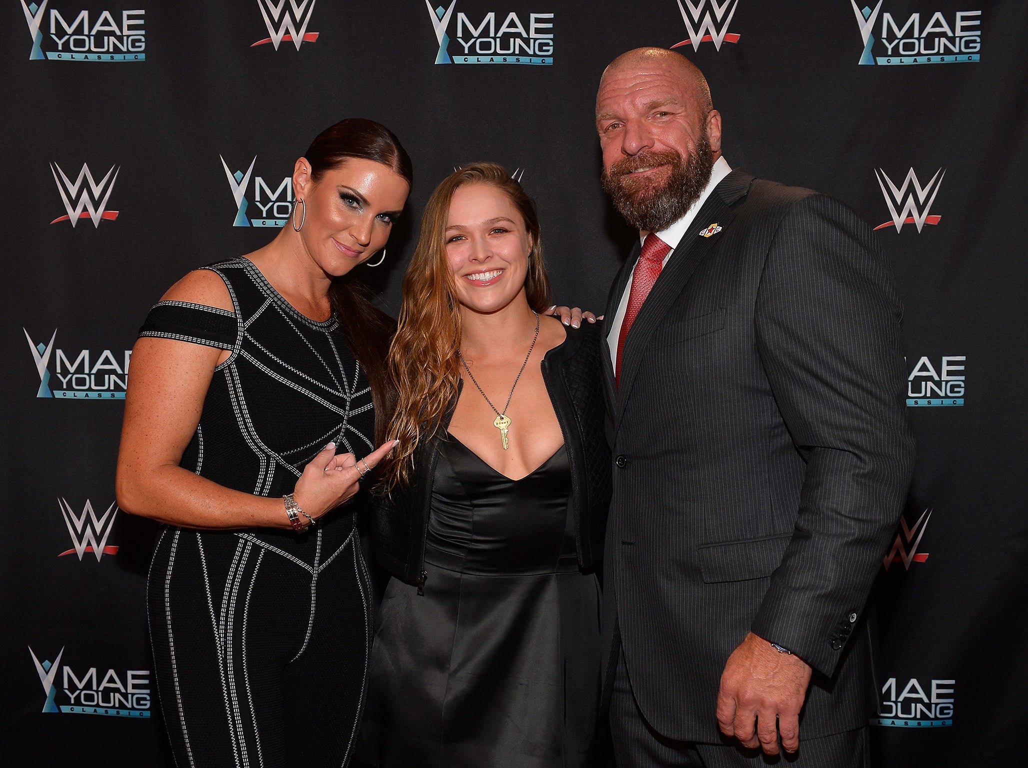 Stephanie McMahon, Ronda Rousey and Triple H