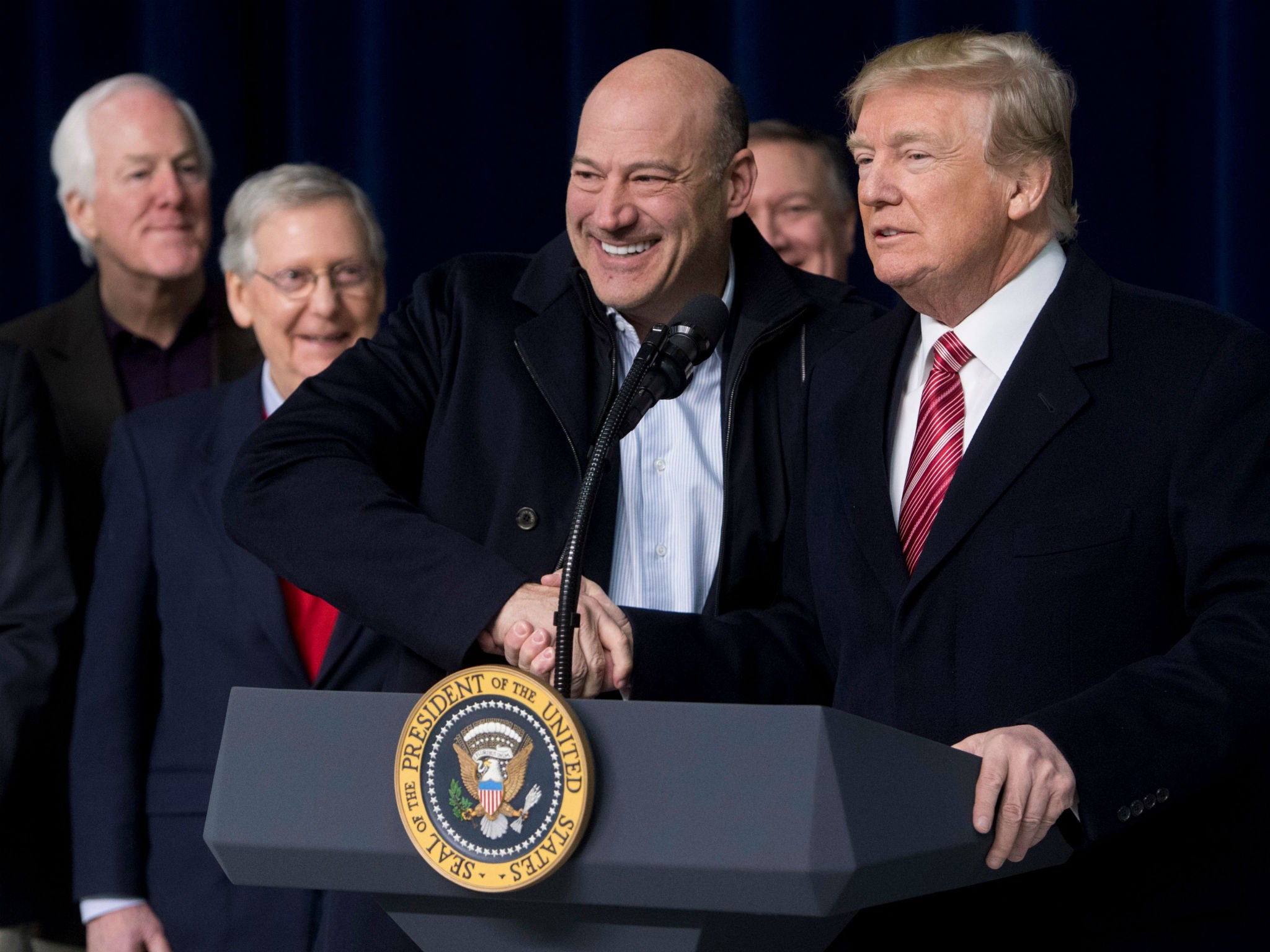 President Donald Trump shakes hands with Gary Cohn during a Republican retreat earlier this year