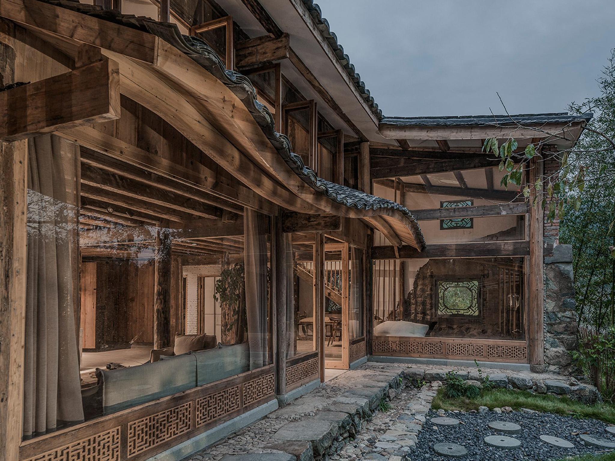 The Springstream Guesthouse blossomed from an idea to create a structure that ‘was like a tree rooted into the ground, growing inside its surroundings’