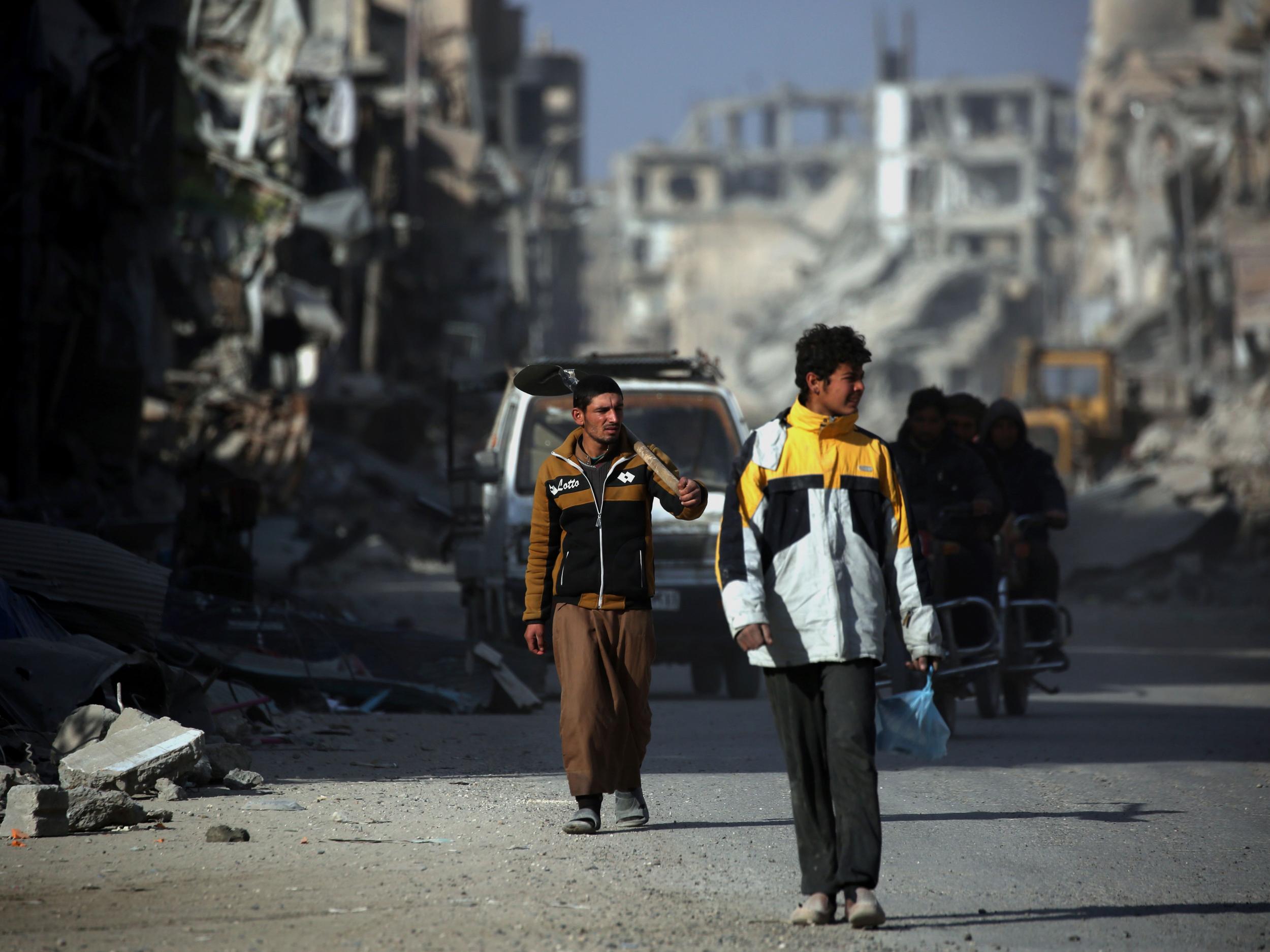 &#13;
Those who do try to rebuild here face the constant threat of unexploded mines and bombs, and deliberate booby-traps placed by Isis (Getty)&#13;