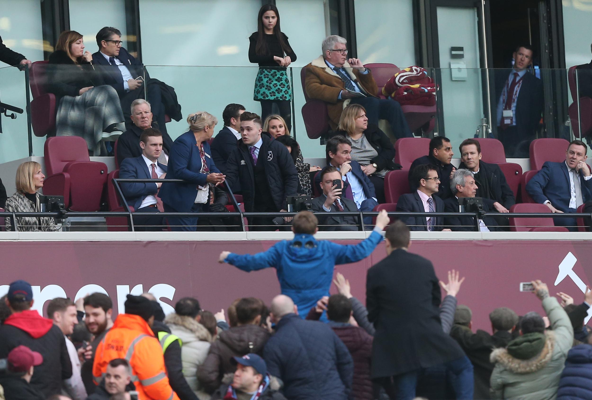 West Ham fans confront the director's box