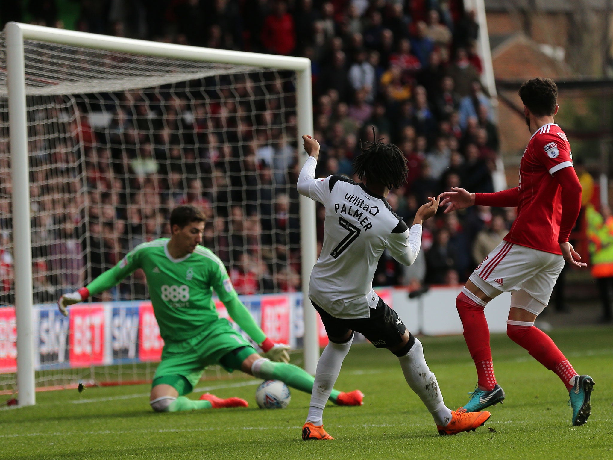 Kasey Palmer's shot on goal is saved by Costel Pantilimon