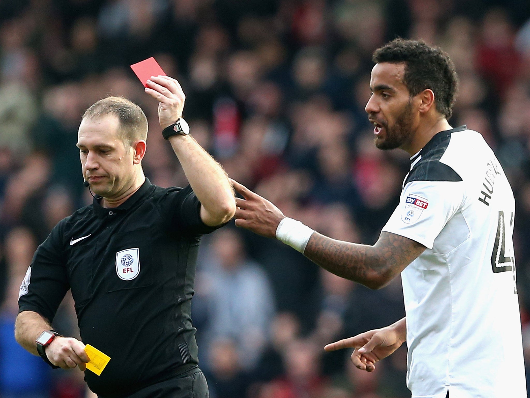 Tom Huddleston is dismissed for a second yellow card