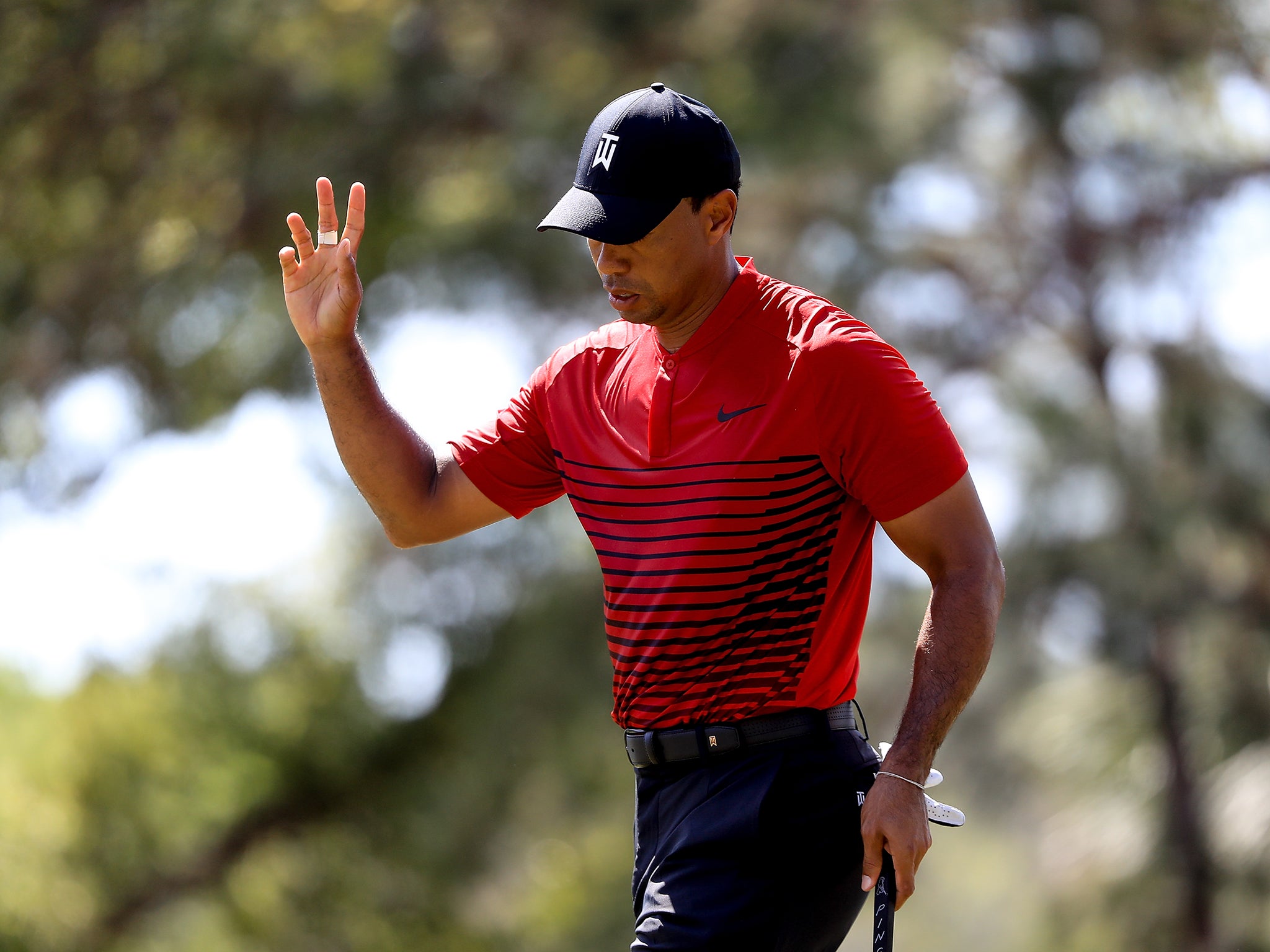 Woods holed a brilliant birdie putt at the 17th to give himself a chance of forcing a play-off