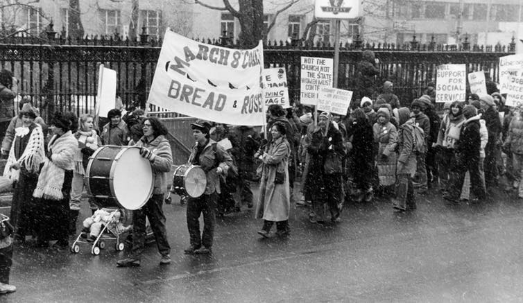 Protestors march through heavy snowfall in Toronto, Canada, on International Women’s Day in 1980