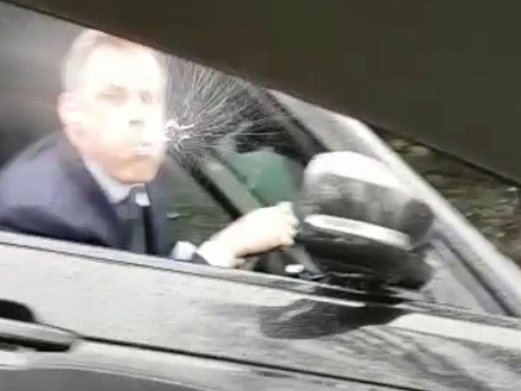 &#13;
Carragher reacted by spitting out of his car when taunted about Liverpool's defeat &#13;