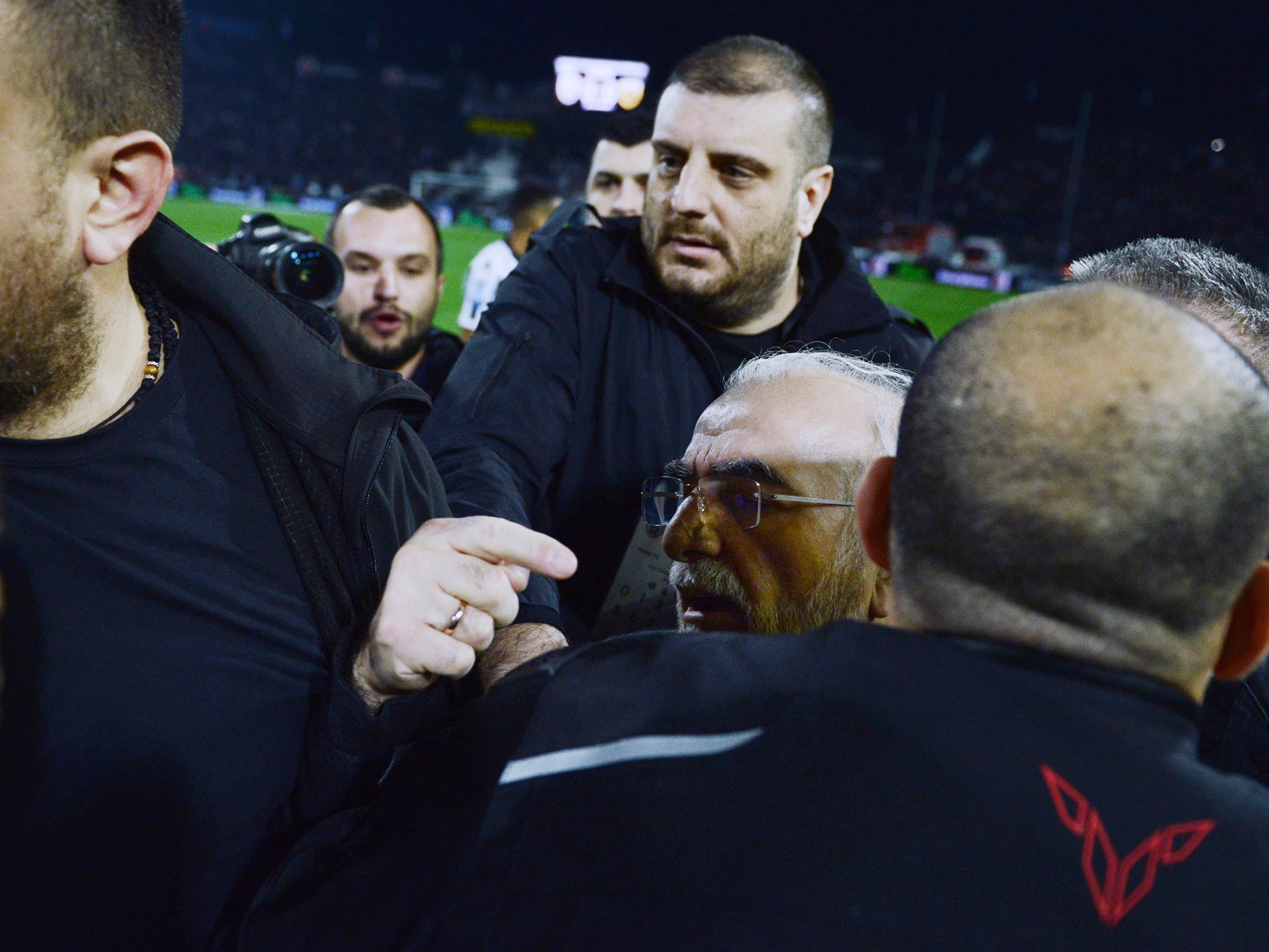 Savvidis had to be restrained from reaching referee Georgios Kominis