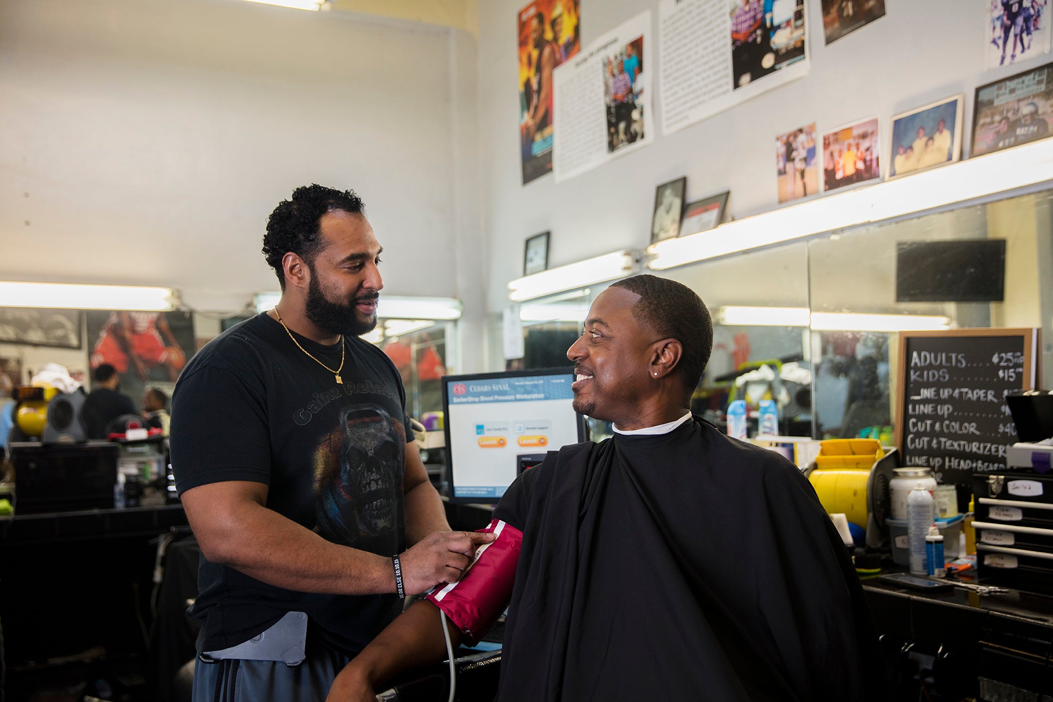 Barber Eric Mohammad and patron Mark Sims during the trial