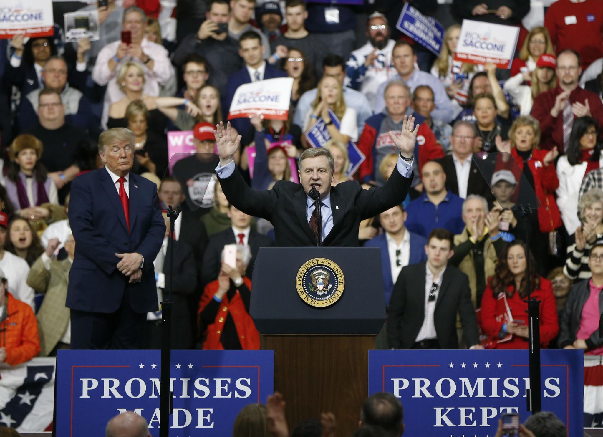 Republican Rick Saccone acknowledges the crowd during a campaign rally with President Donald Trump