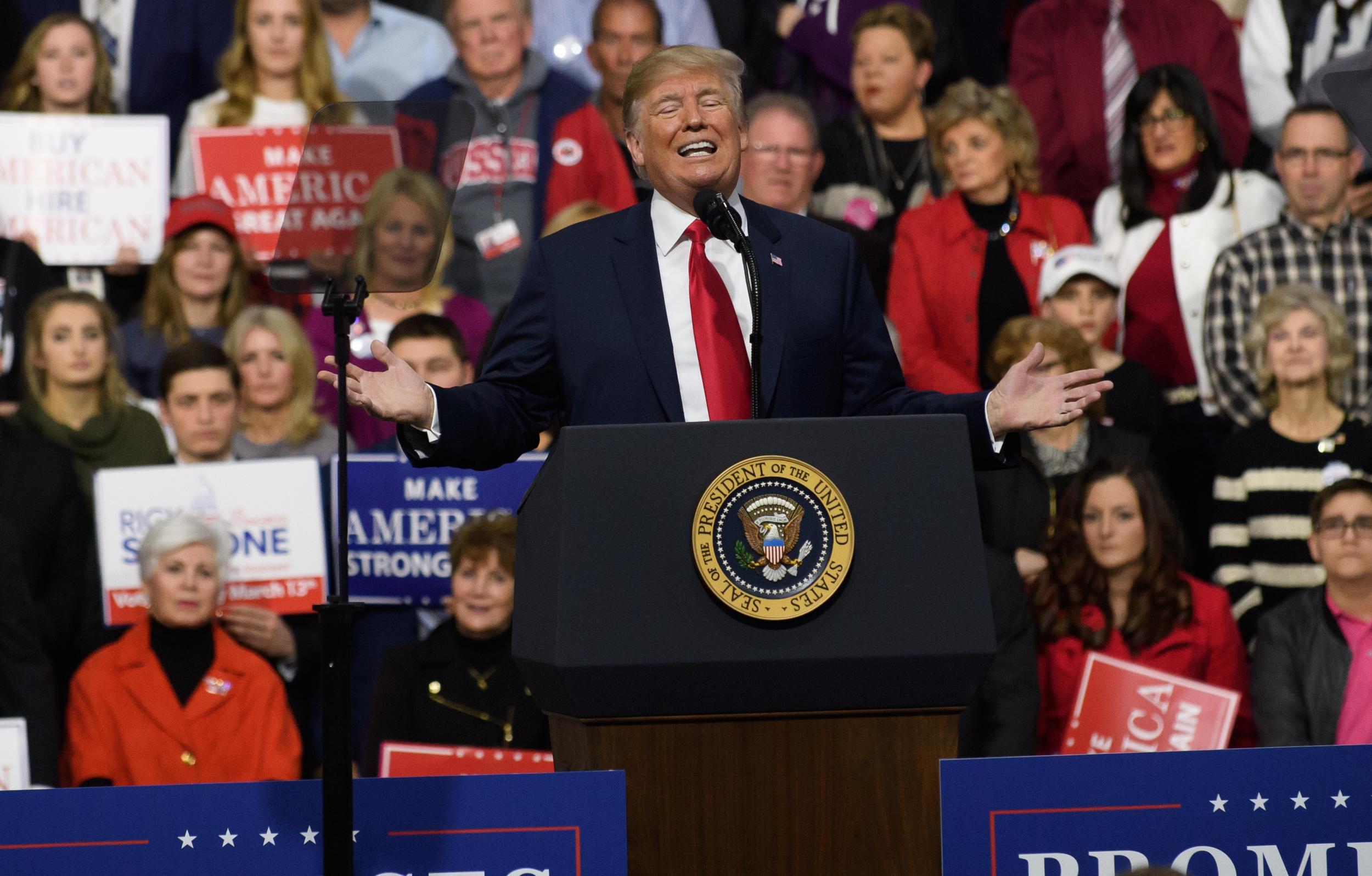 President Donald Trump speaks to supporters at the Atlantic Aviation Hanger in Moon Township, Pennsylvania