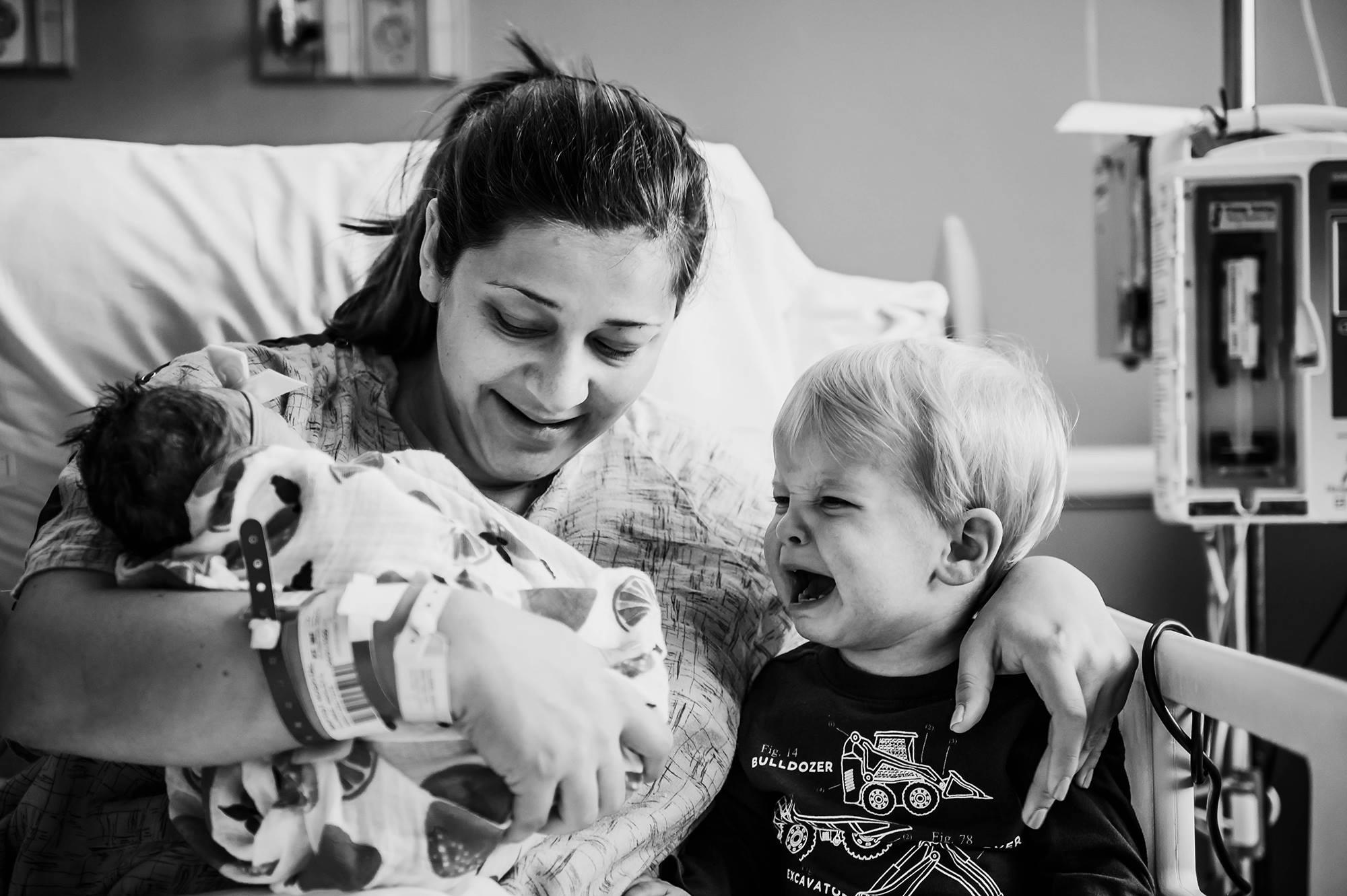 22-month-old Jackson couldn't contain his tears when meeting his baby sister for the first time