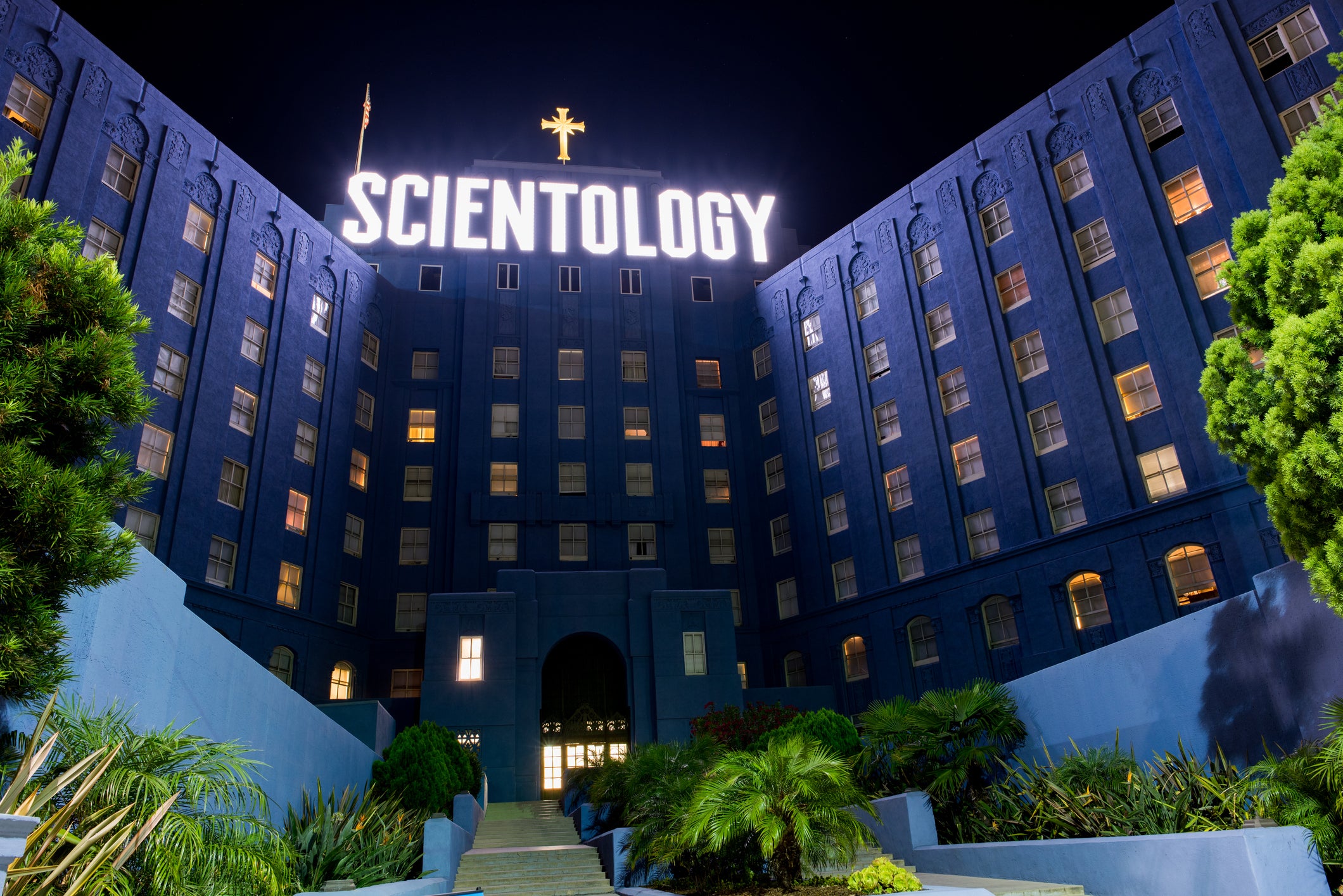 The Church of Scientology International has been sued by an ex-Scientologist accusing it over child abuse and human trafficking.