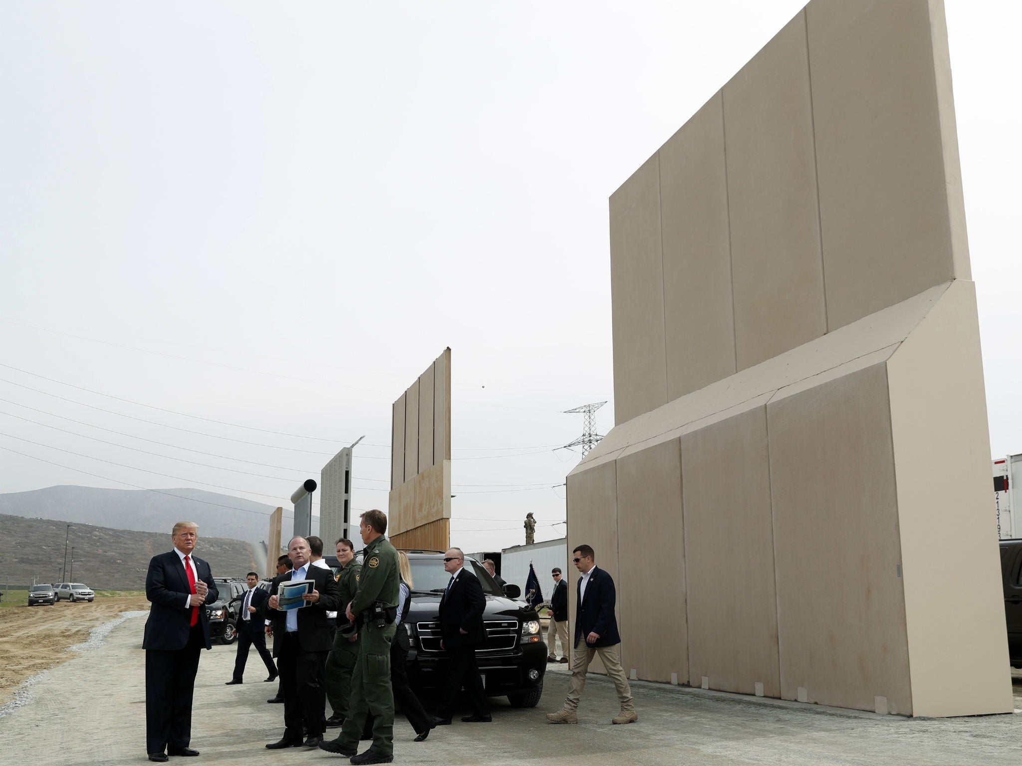 Donald Trump participates in a tour of US-Mexico border wall prototypes near the Otay Mesa Port of Entry in San Diego, California