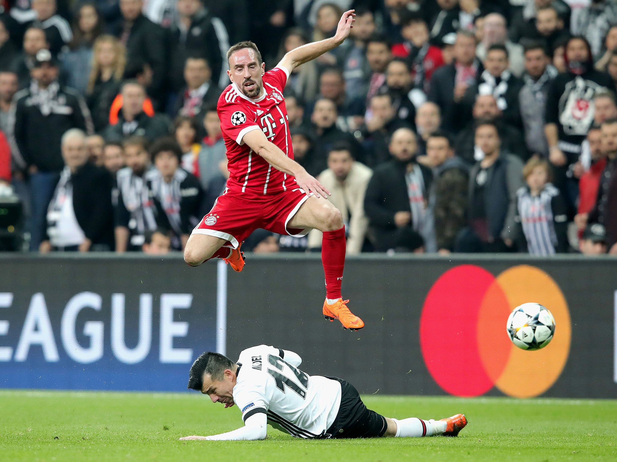 Franck Ribery is challenged by Gary Medel