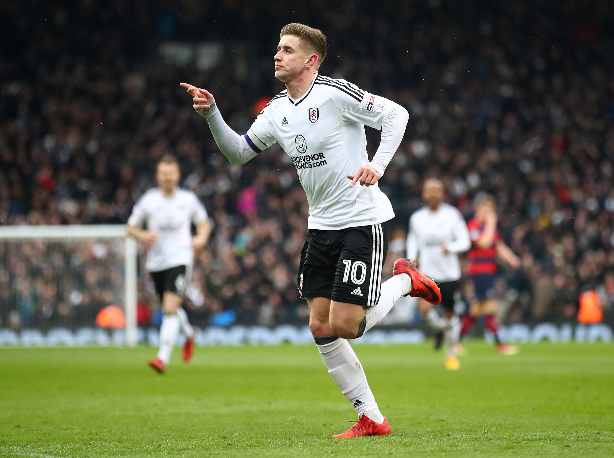 Tom Cairney of Fulham celebrates scoring his side’s first goal