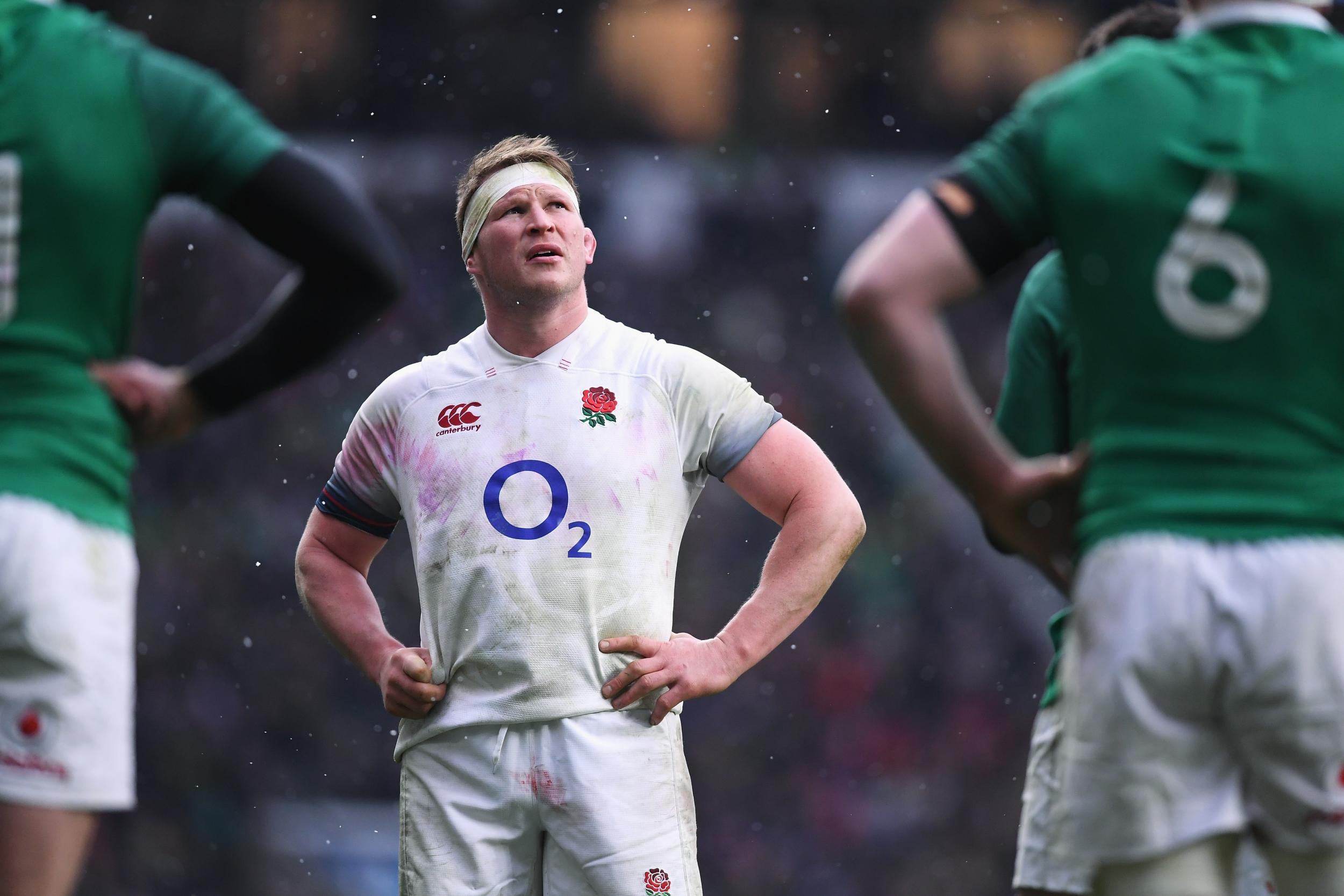 A dejected Dylan Hartley looks on after Ireland's second try