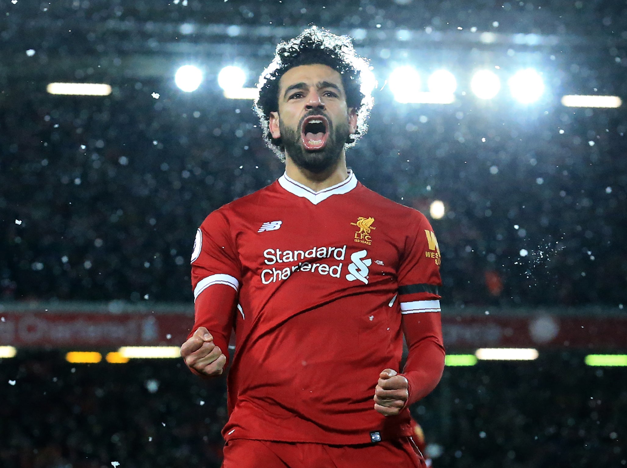 Salah celebrates his third goal under the lights