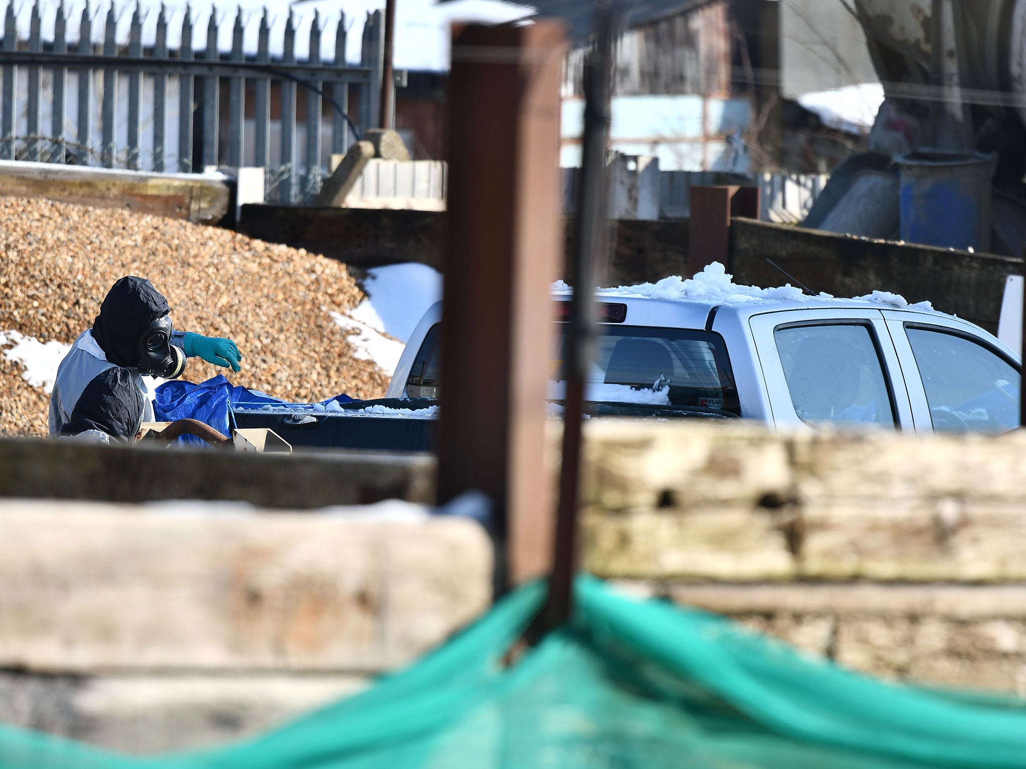 &#13;
Military personnel removed a vehicle used to pick up Yulia Skripal from Heathrow Airport in Durrington (AFP/Getty)&#13;