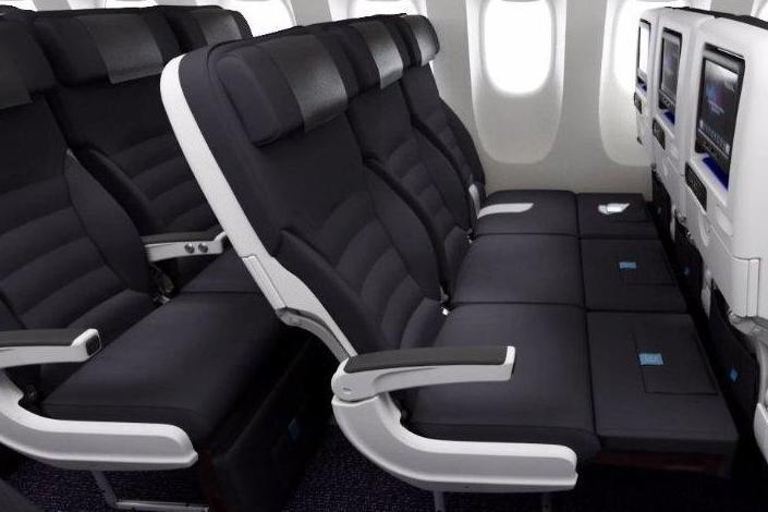 Air New Zealand's Skycouch allows for a row of three economy seats to be converted into a flat bed