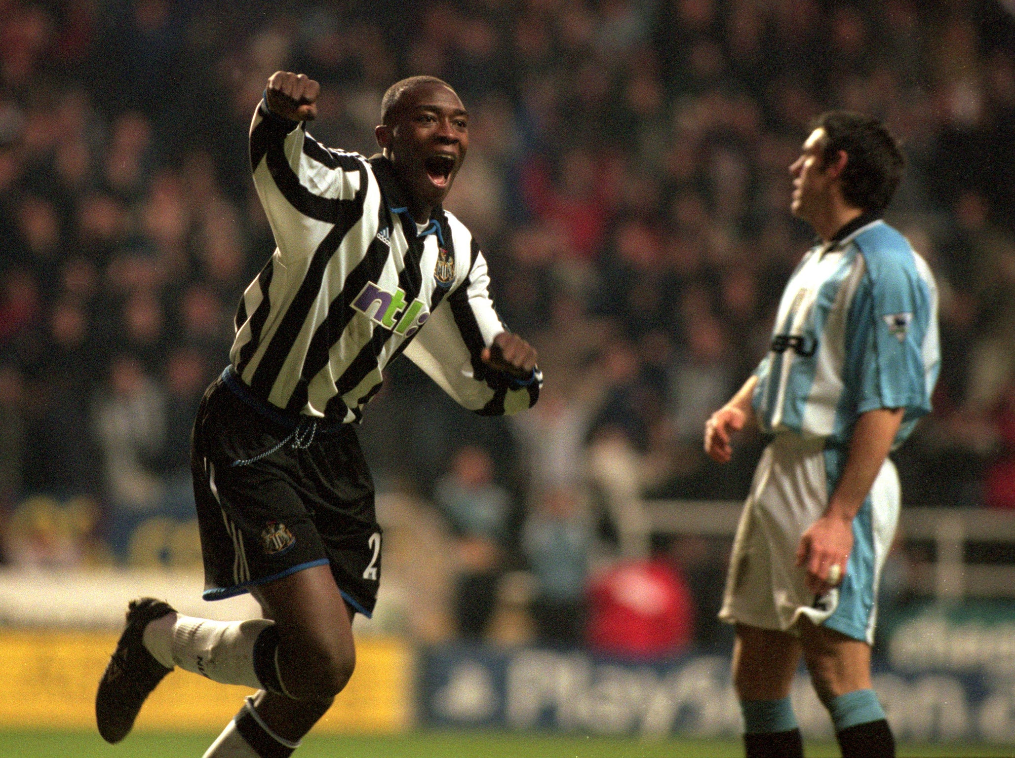 Celebrating his first goal in professional football, in 2001