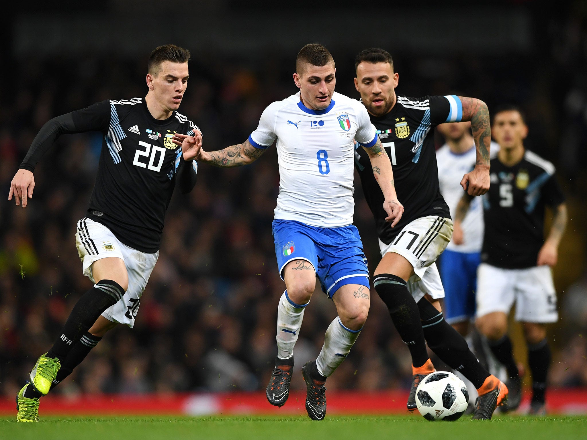 Marco Verratti is put under pressure by Giovani Lo Celso