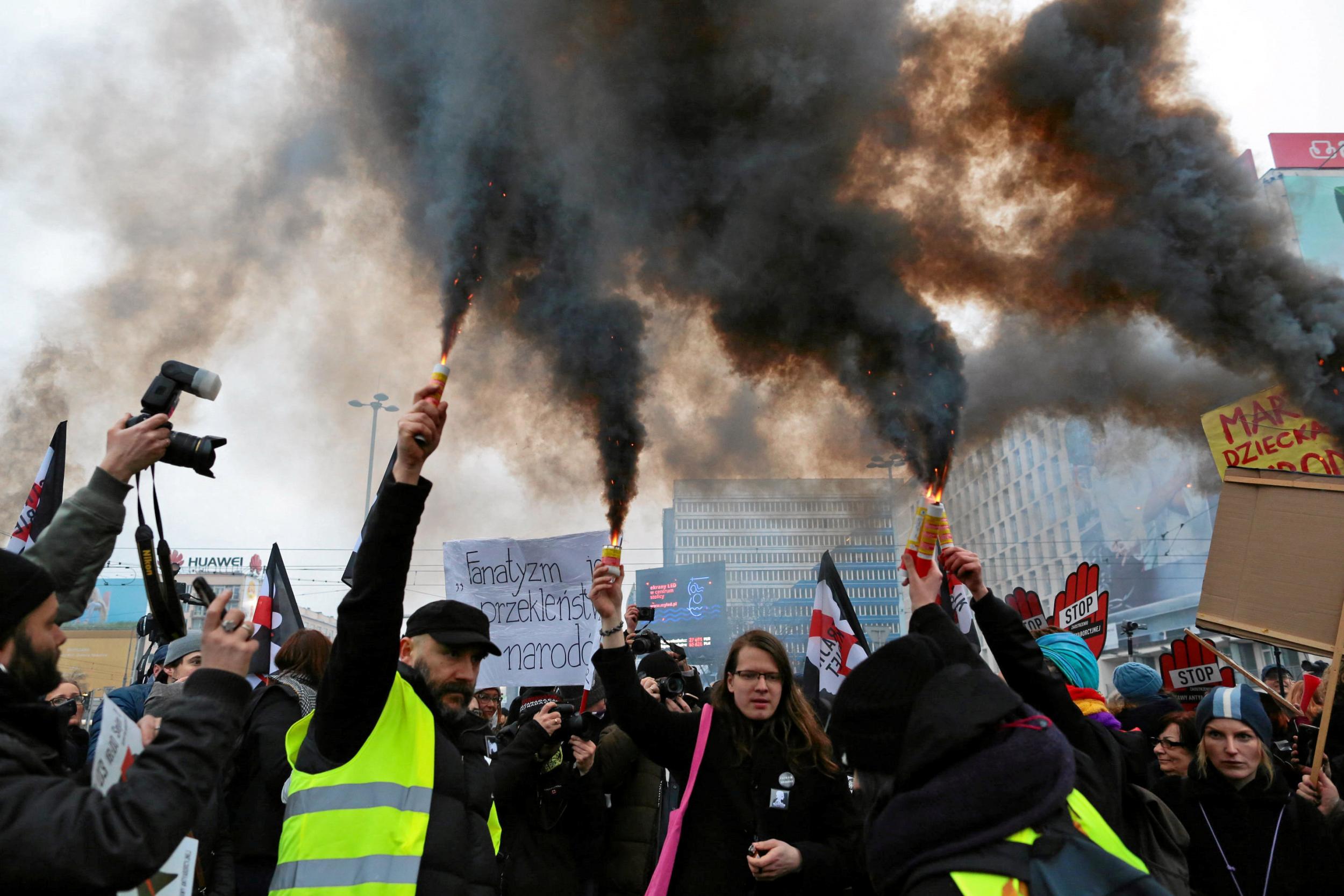 People gather in Warsaw to protest against plans to further restrict abortion laws,