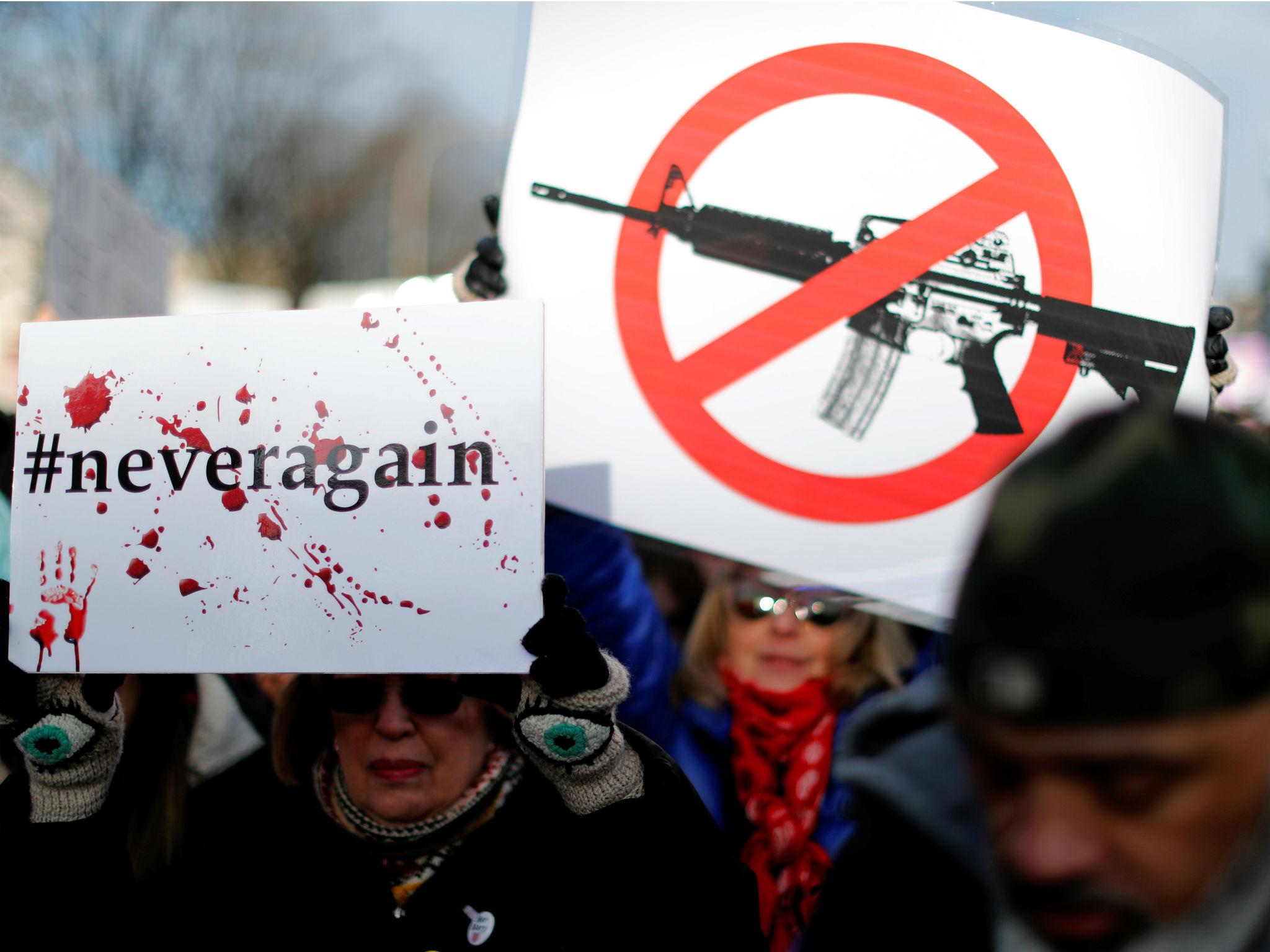 Demonstrators join students and gun control advocates for the 'March for Our Lives' event in Washington DC