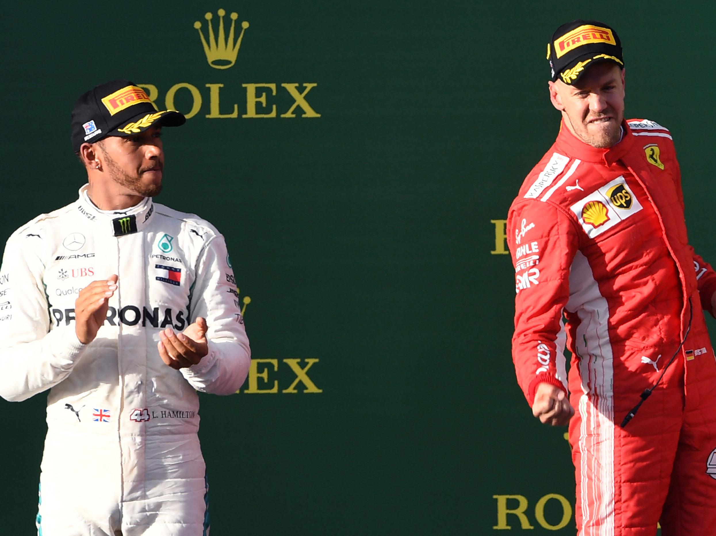 Sebastian Vettel celebrates after clinching the first race of the season