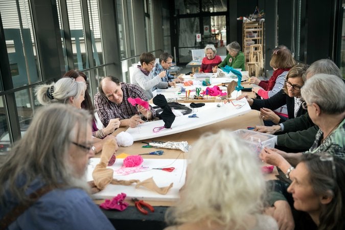 Dementia patients take part in a workshop at the museum