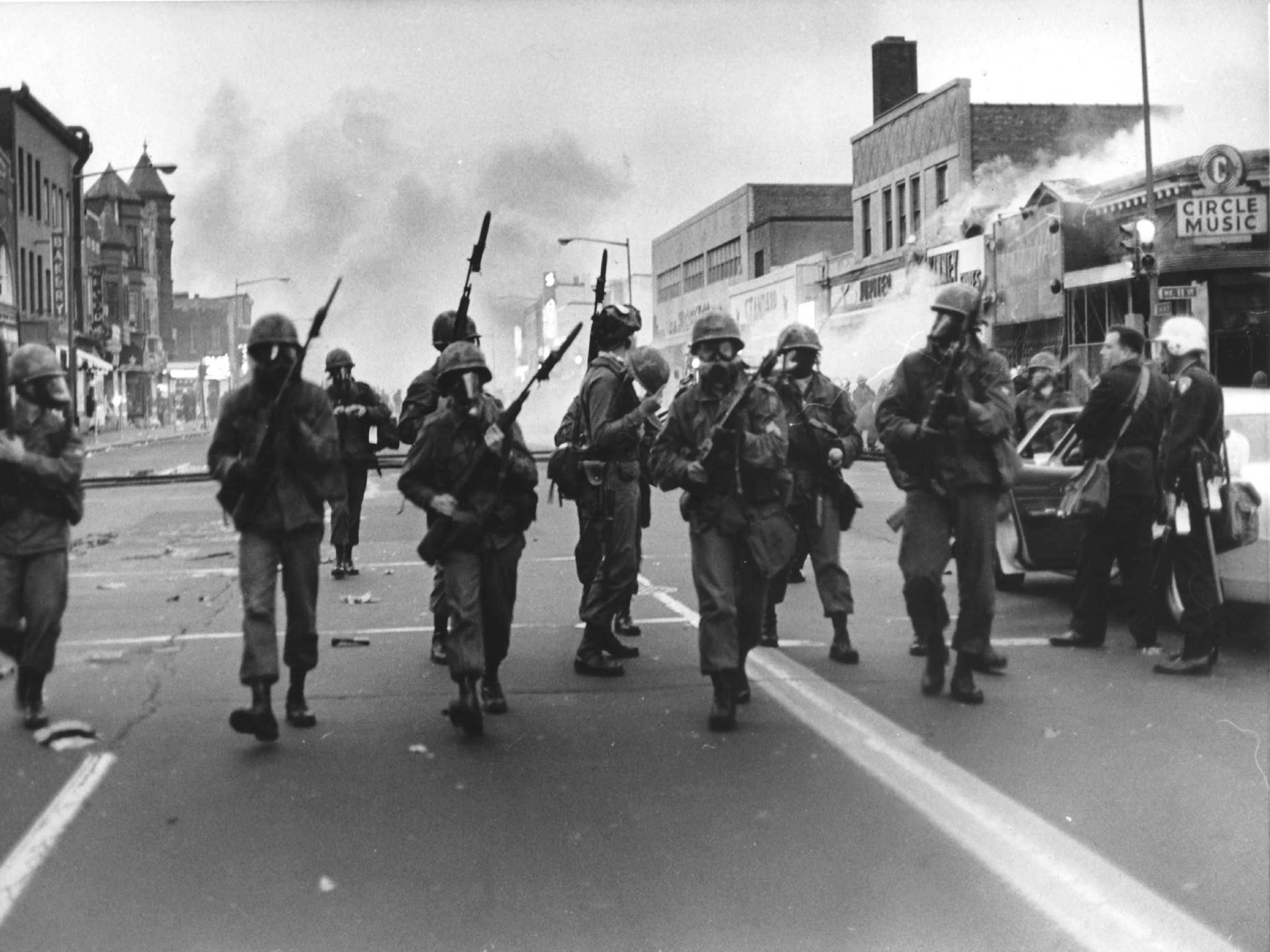 Cavalry troops sweep along High Street in Washington during the 1968 riots