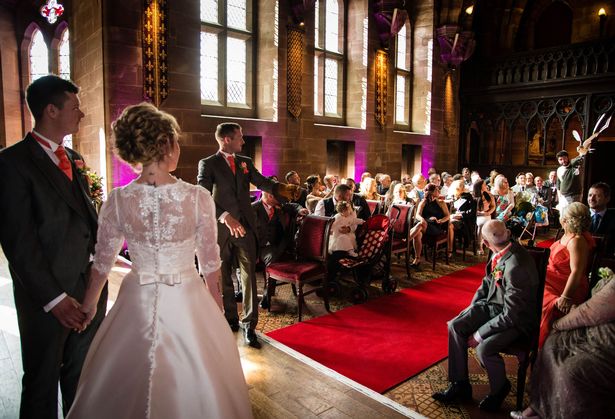 Bride and groom Jeni Arrowsmith and Mark Wood await their owl