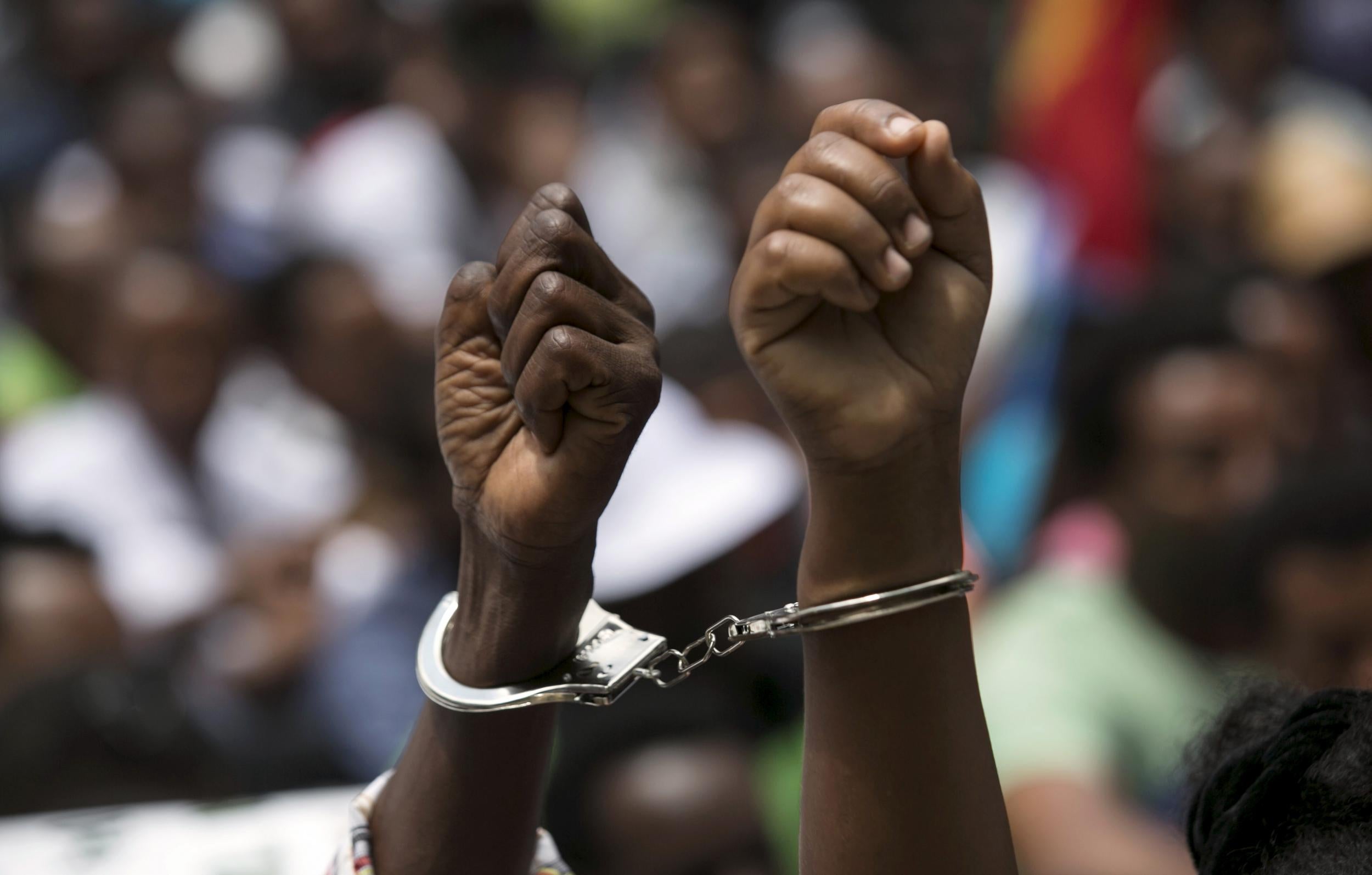 Migrants from Eritrea take part in a protest outside the European Union delegation in Ramat Gan near Tel Aviv on 25 June 2015