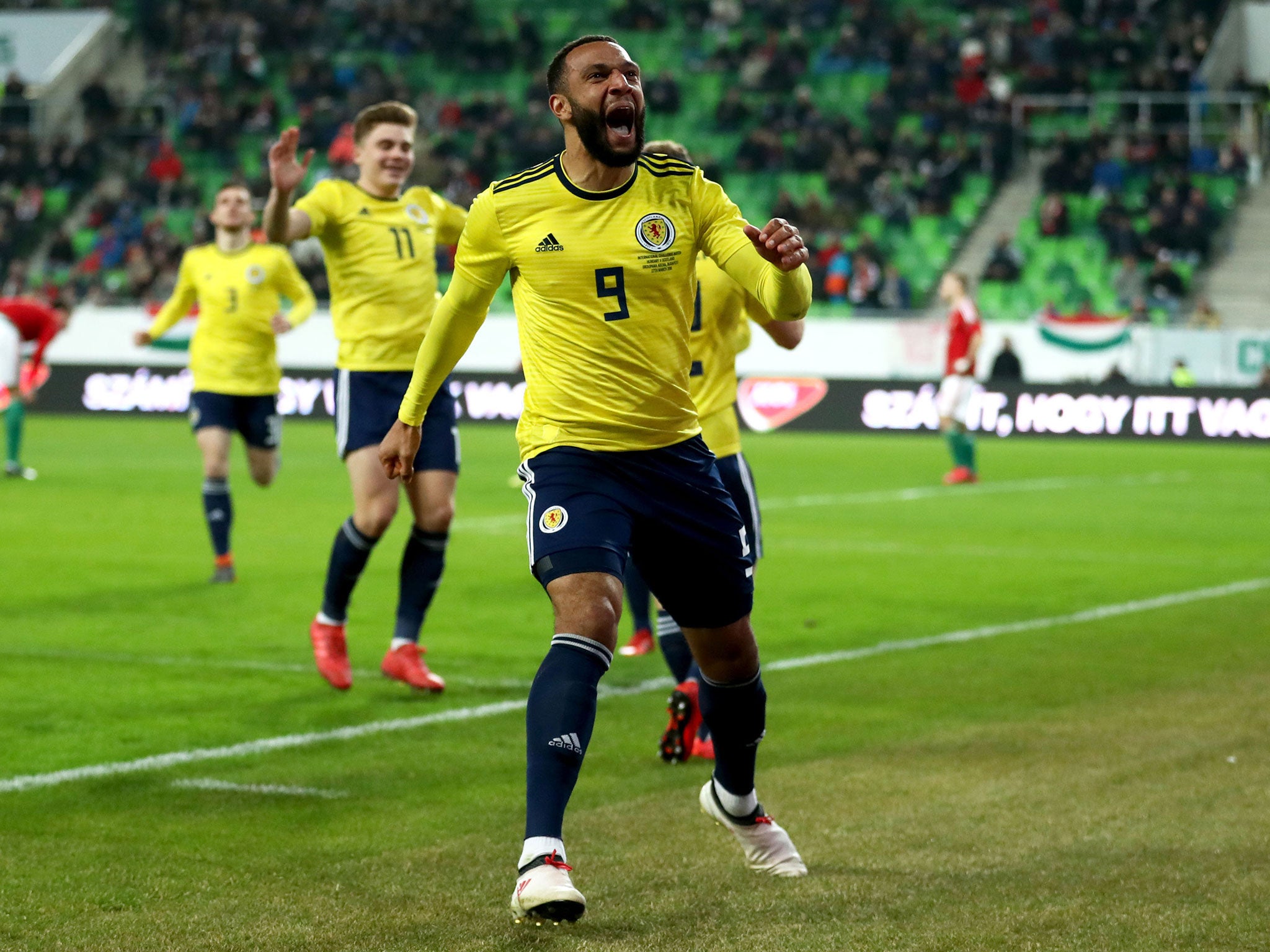 Matt Phillips celebrates what proved to be the winner for Scotland